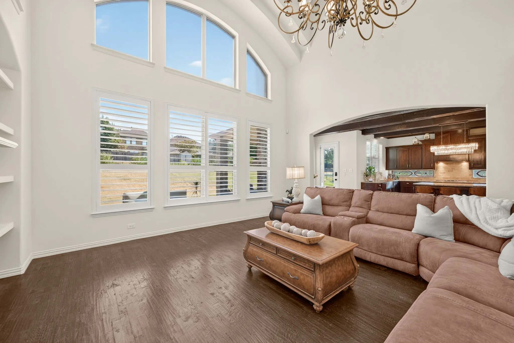 Soaring vaulted ceiling with an ornate chandelier