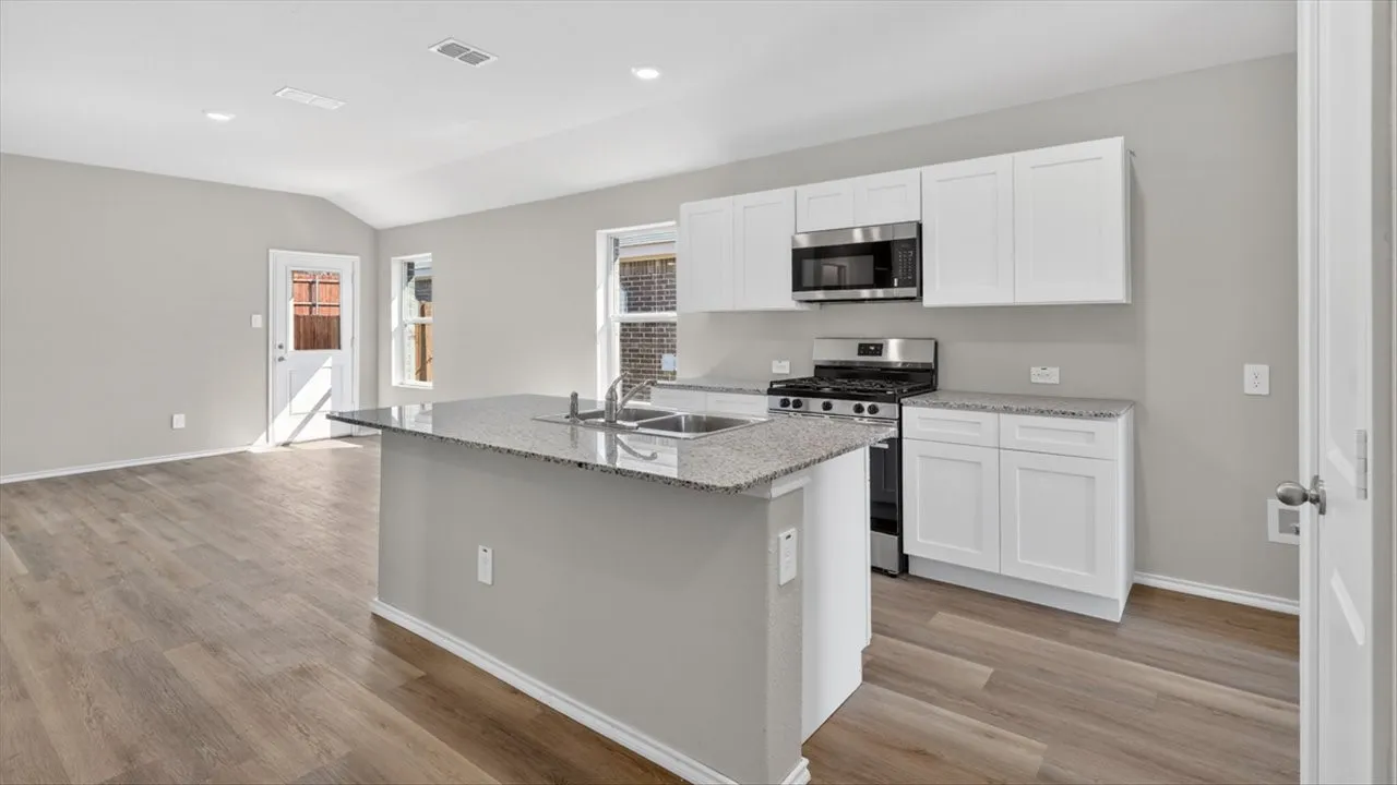 Kitchen-All Home and community information, including pricing, included features, terms, availability and amenities, are subject to change at any time without notice or obligation. All Drawings, pictures, photographs, video, square footages, floor plans, elevations, features, colors and sizes are approximate for illustration purposes only and will vary from the homes as built.