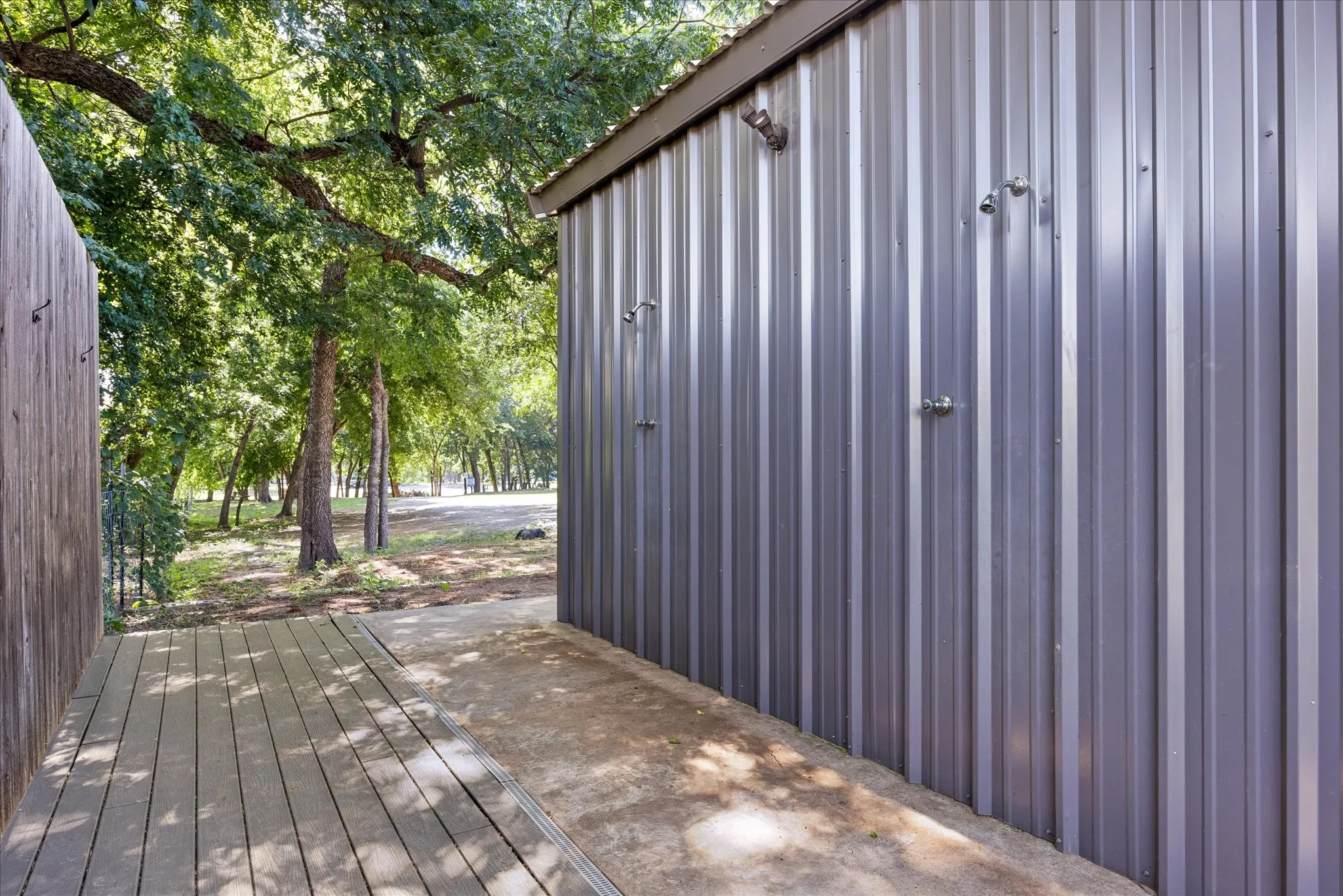 Outdoor shower on back side of restroom