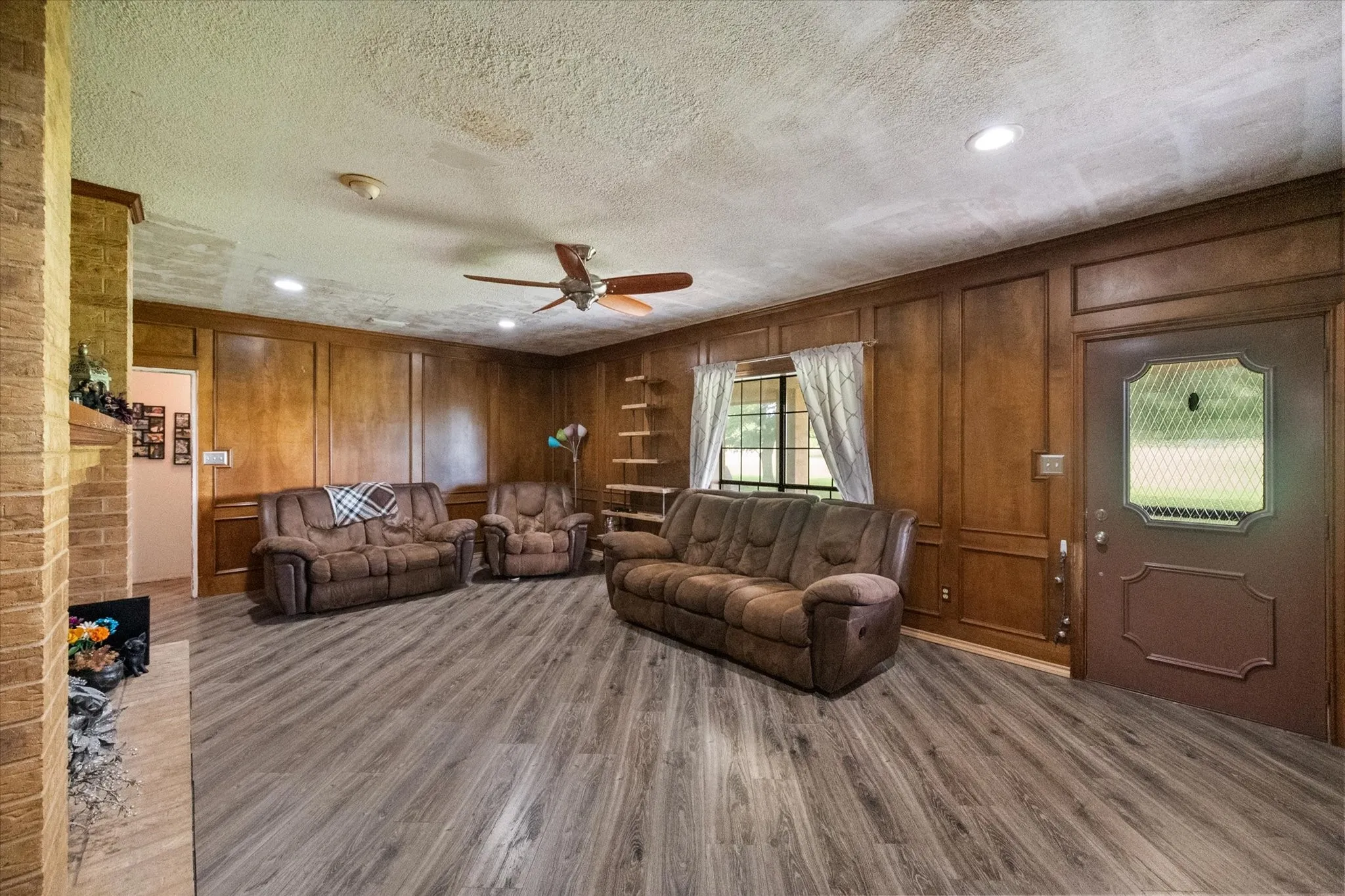 Wood-composite laminate floors. Look like wood but they are water resistent and kid / pet friendly.