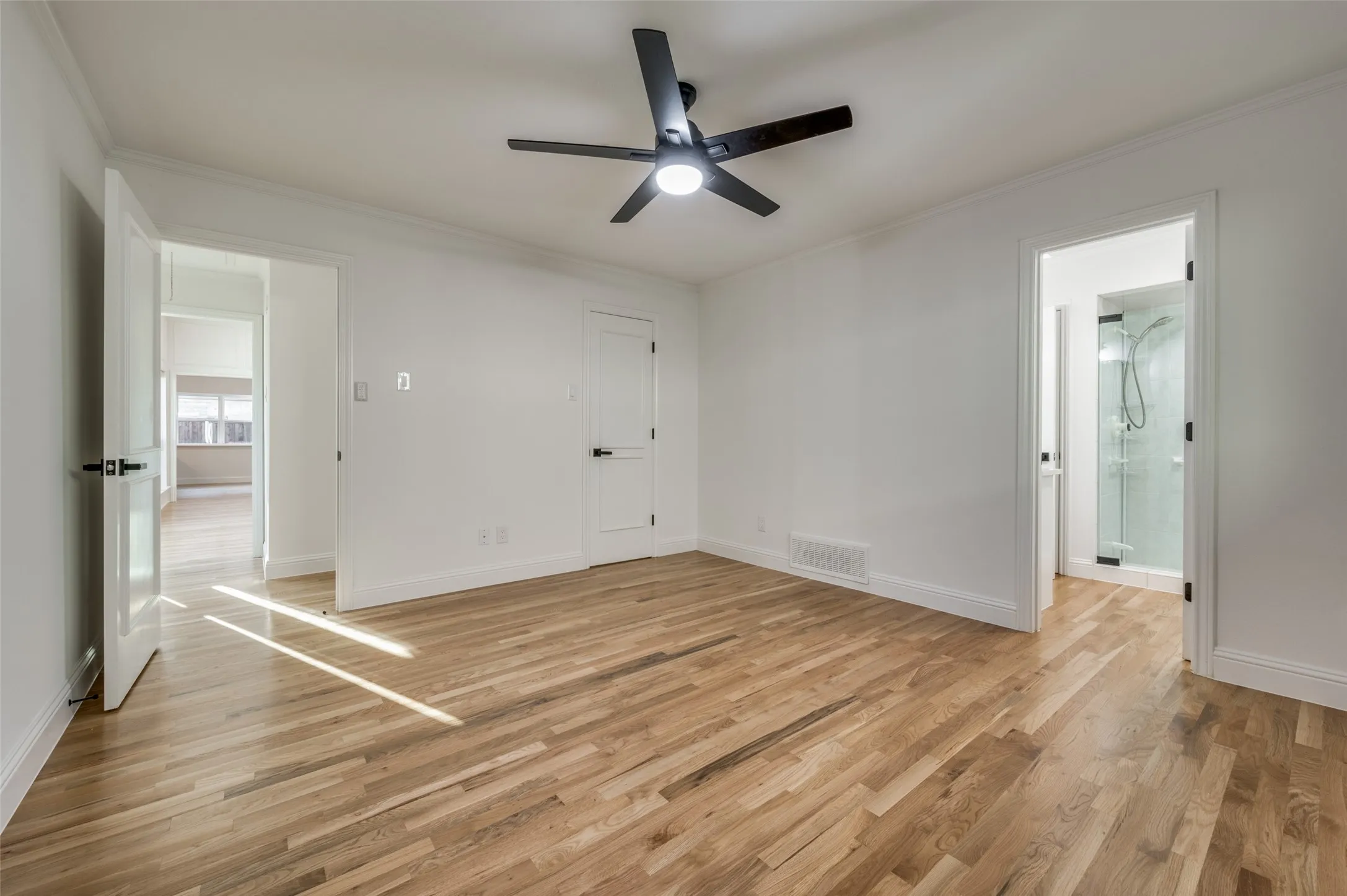 Secondary (middle) bedroom, with family to left rear of photo