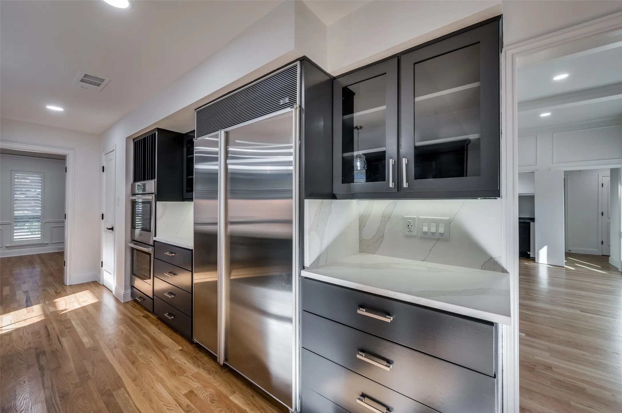 Sub-Zero refrigerator, new Bosch double ovens
