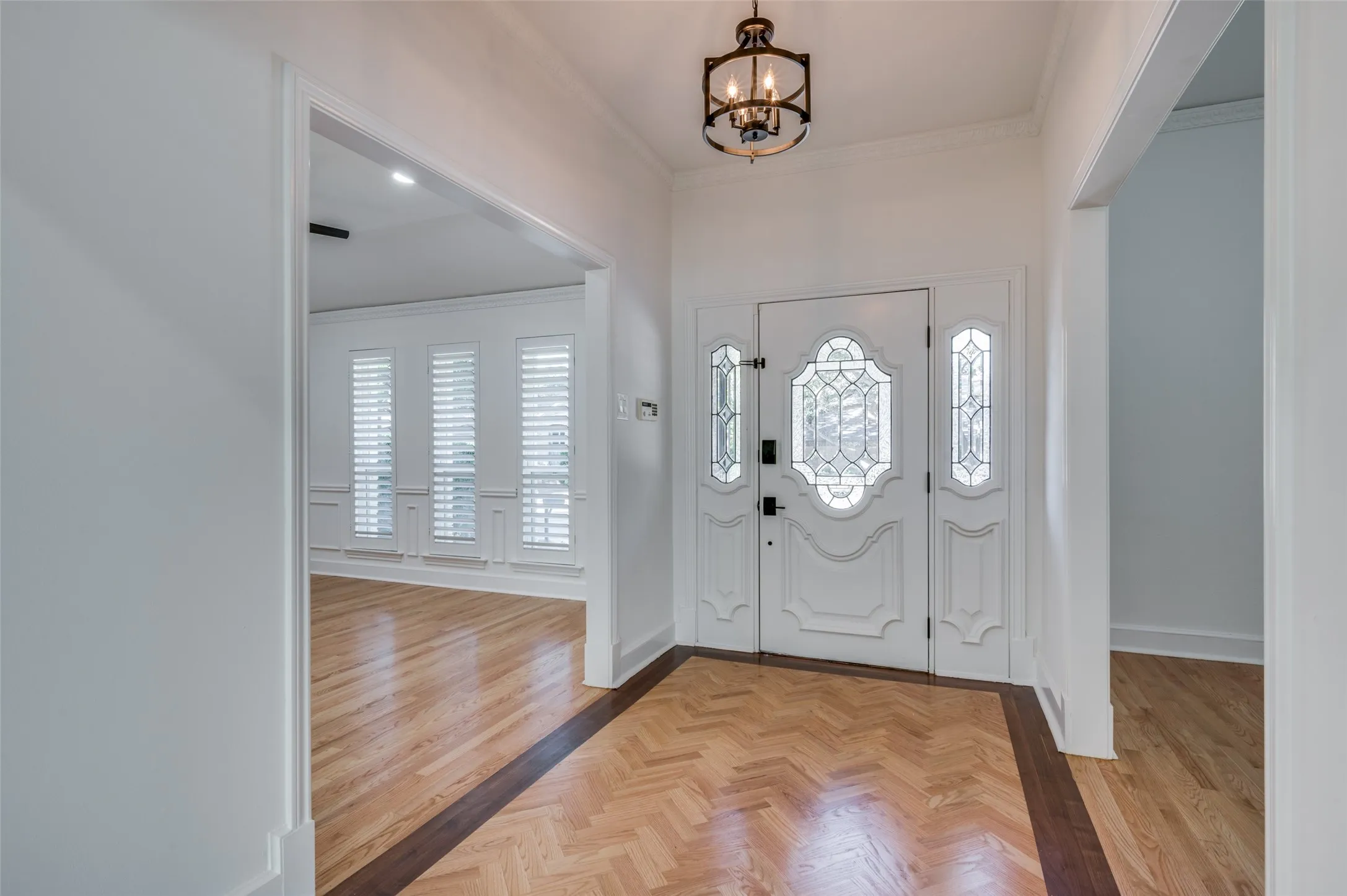 Front entry hall, with dining at left of photo, study to the right in photo