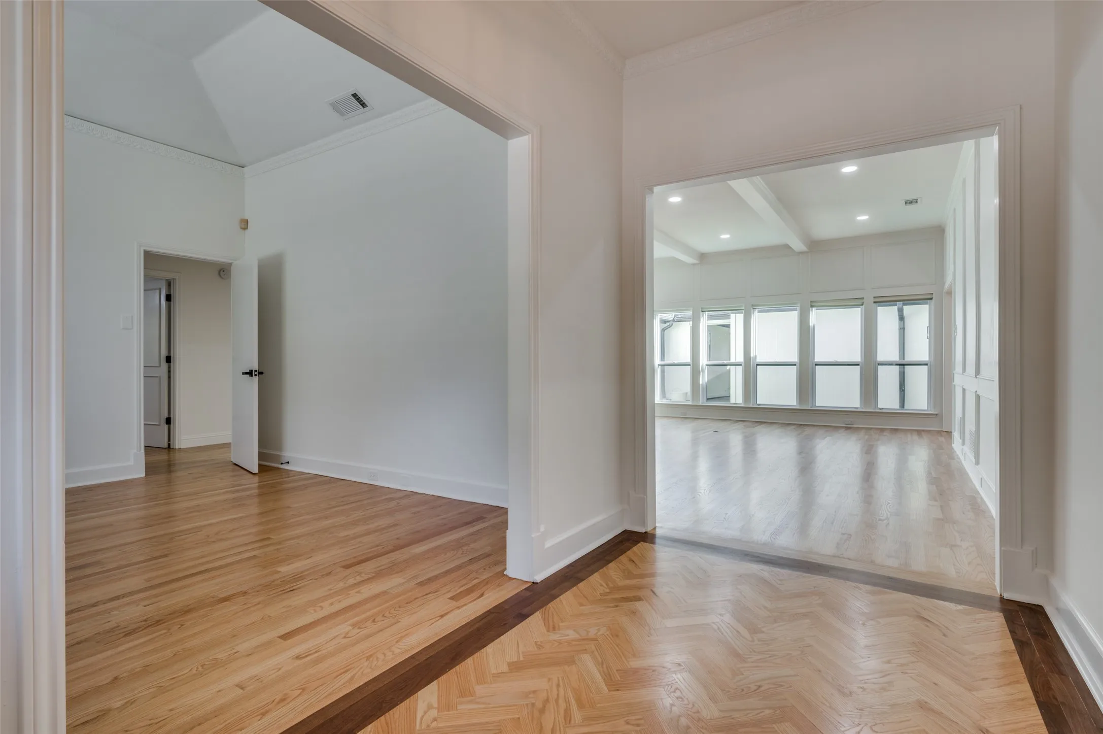 Front entry hall, with study to left, family at right rear