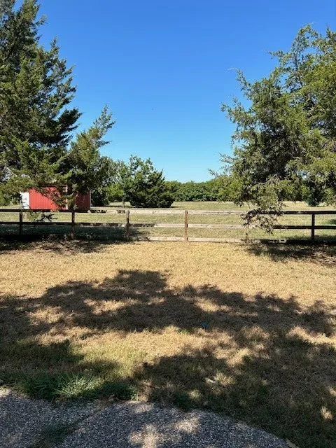 View of yard featuring a view of countryside