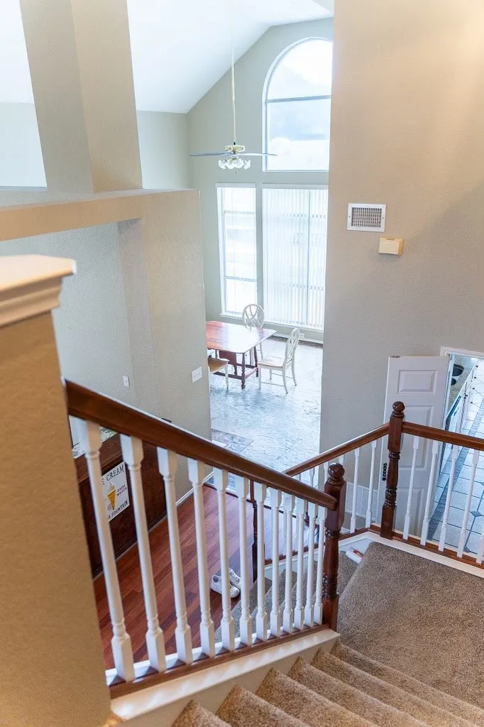 Foyer with high ceilings and arched window