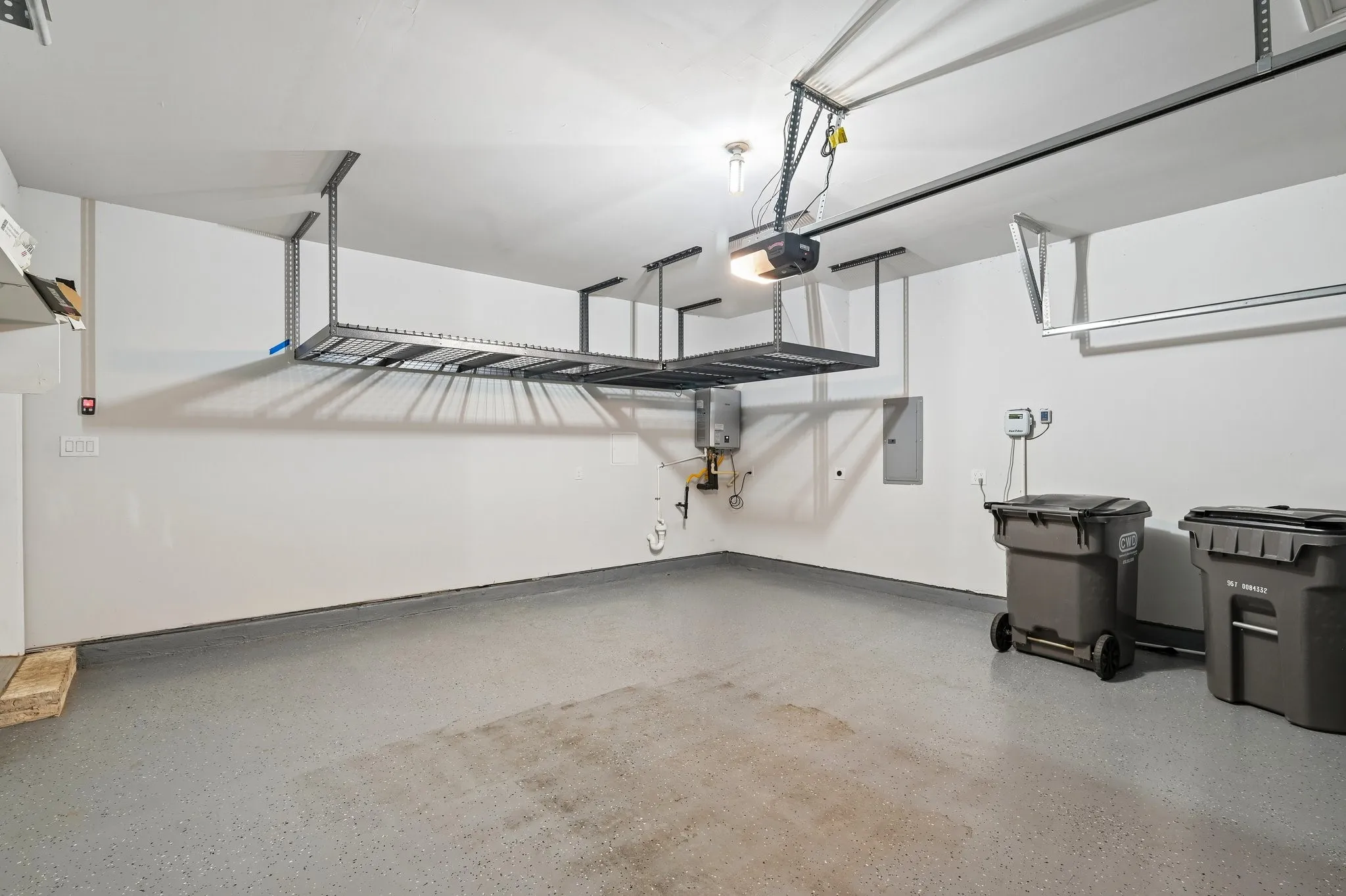 Spacious garage with an epoxy-coated concrete floor
