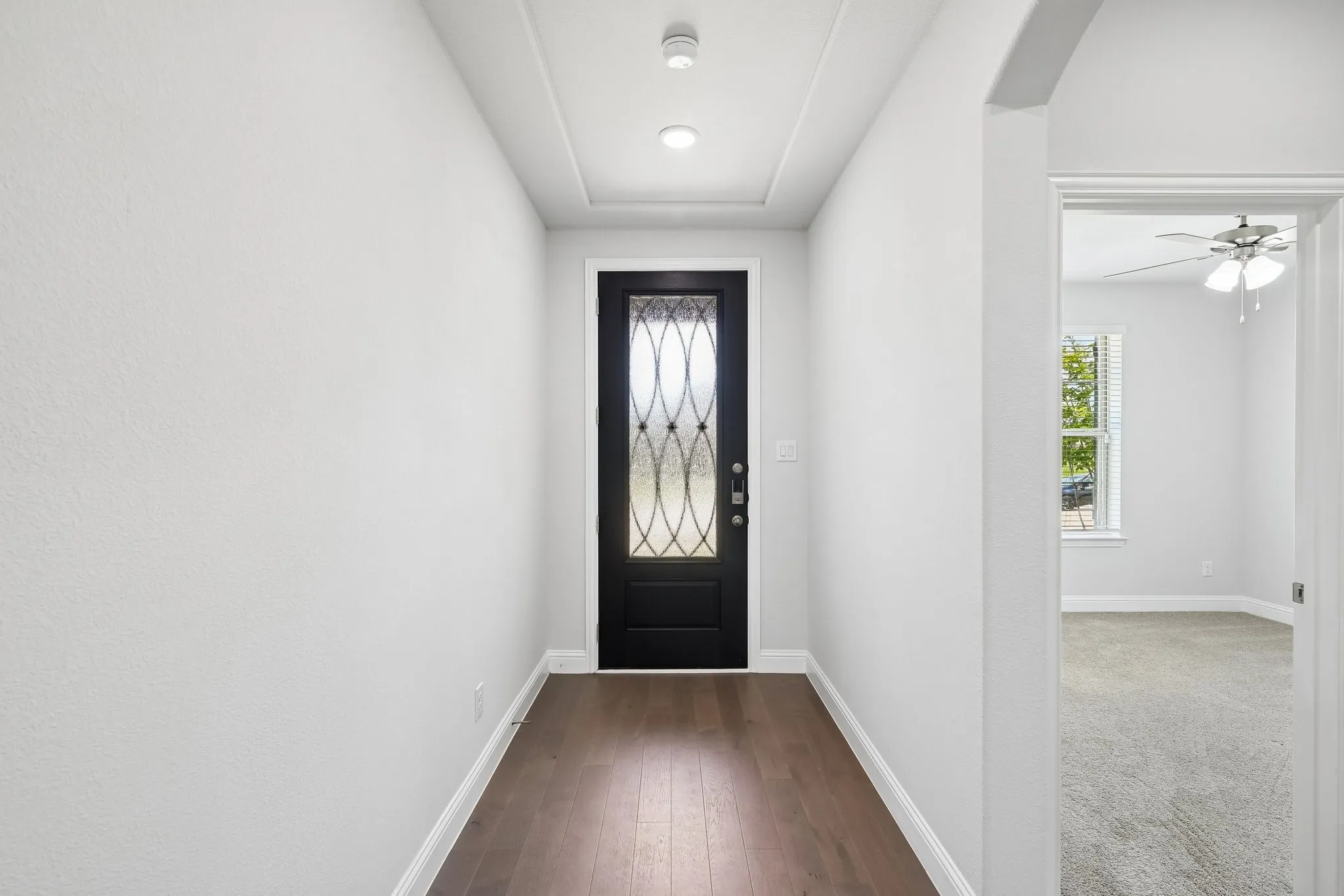 Entryway with wood floors