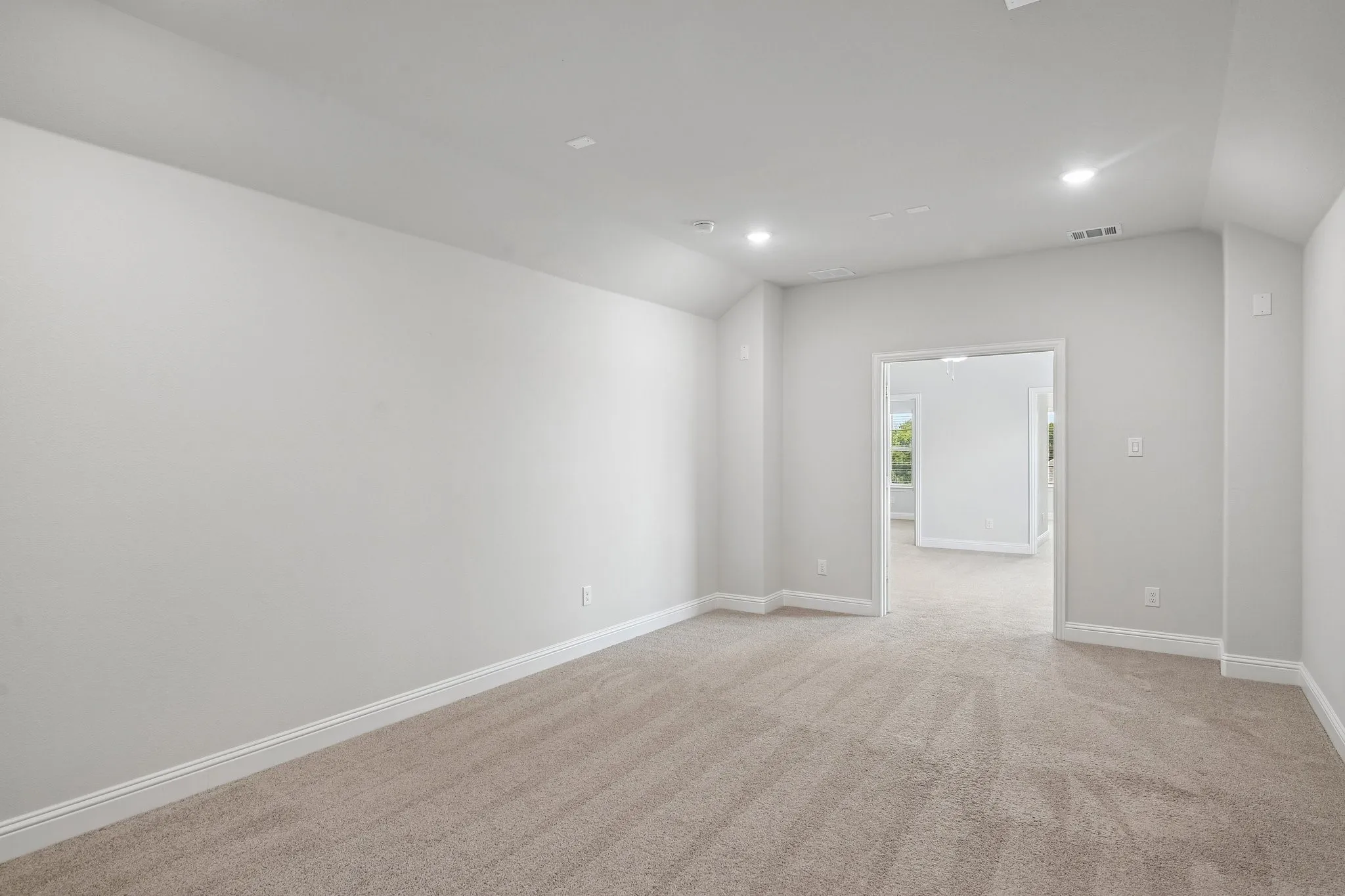 Second floor media room located off the game room