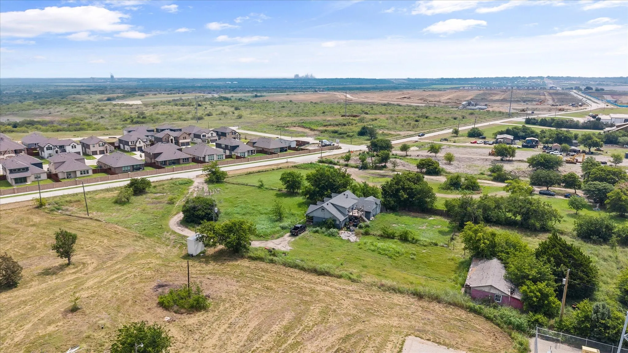 View of exterior of home with the five acres.