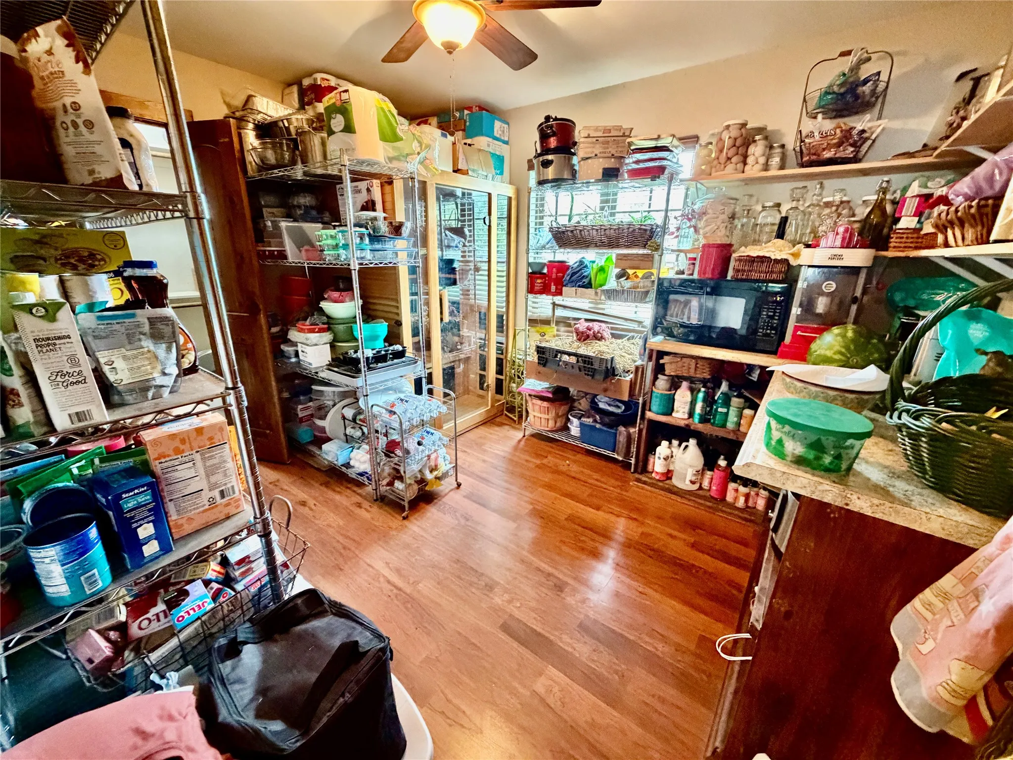 This is the 5th bedroom but the current owners transformed it into their pantry! Could be an office as well!