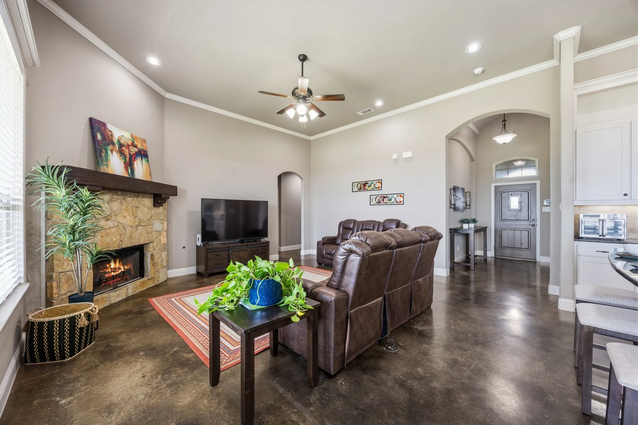 Gas or wood burning fireplace. Tall ceilings. Crown molding.
