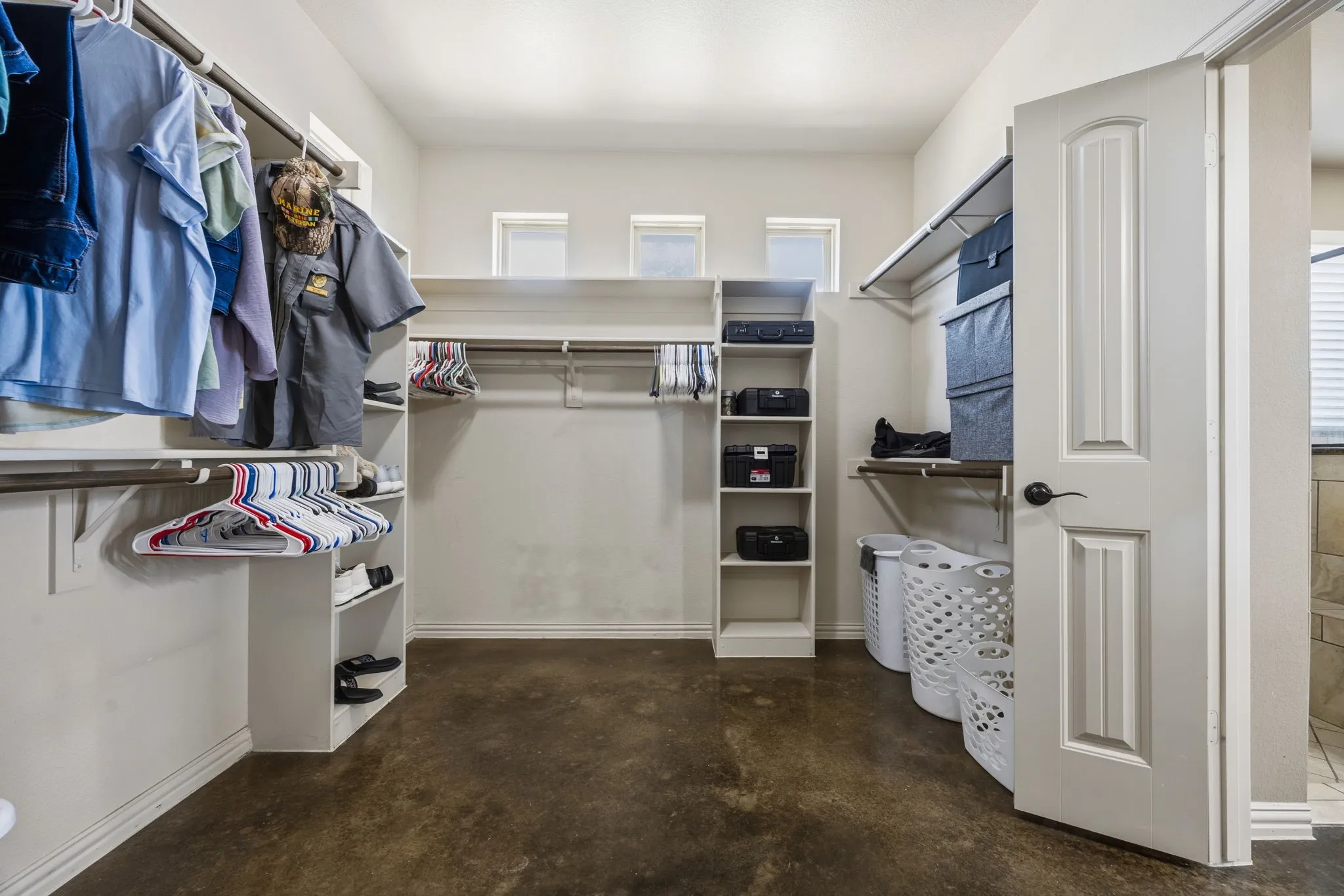 Huge walk-in closet in primary.