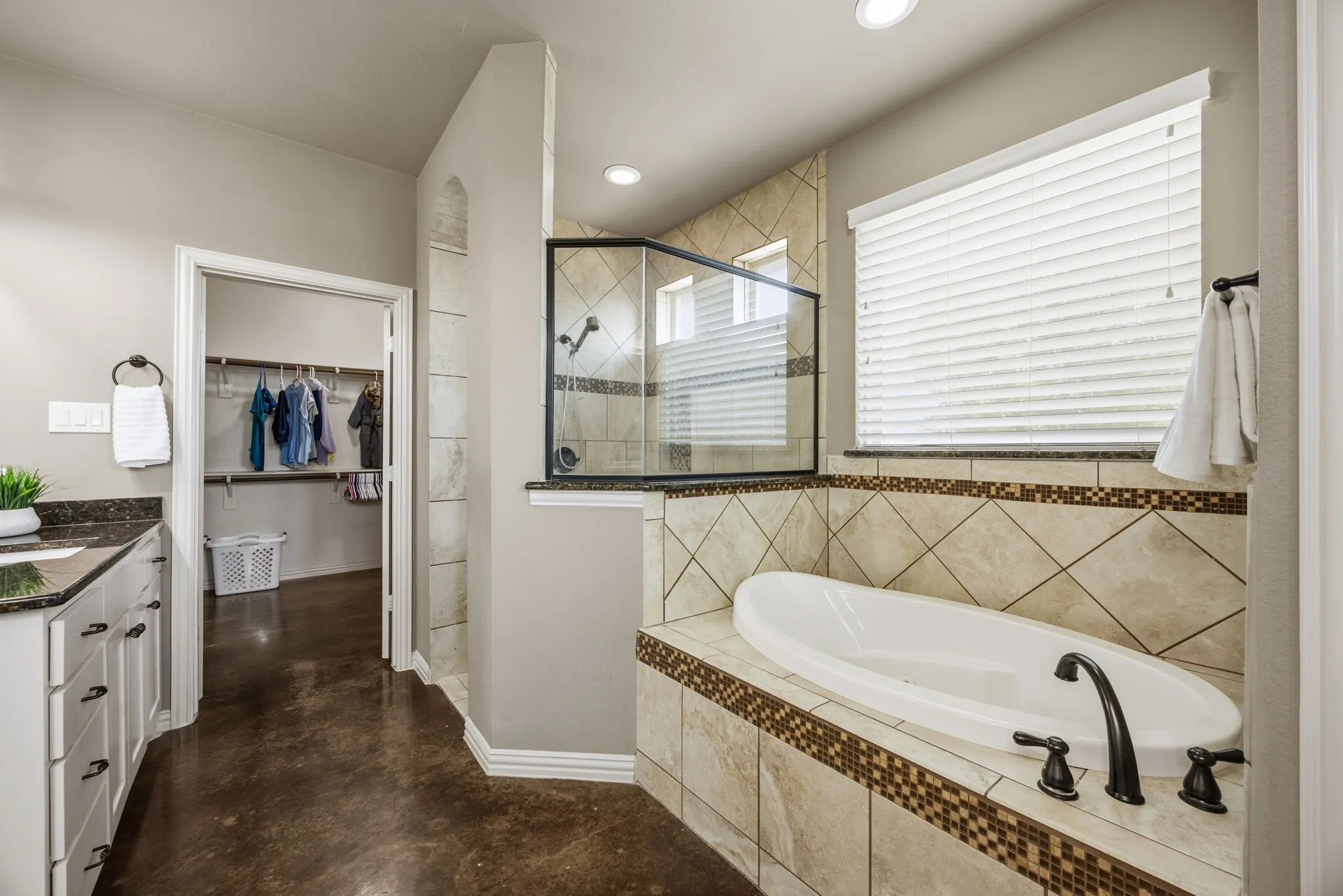 Huge walk-in closet with laundry room access.
