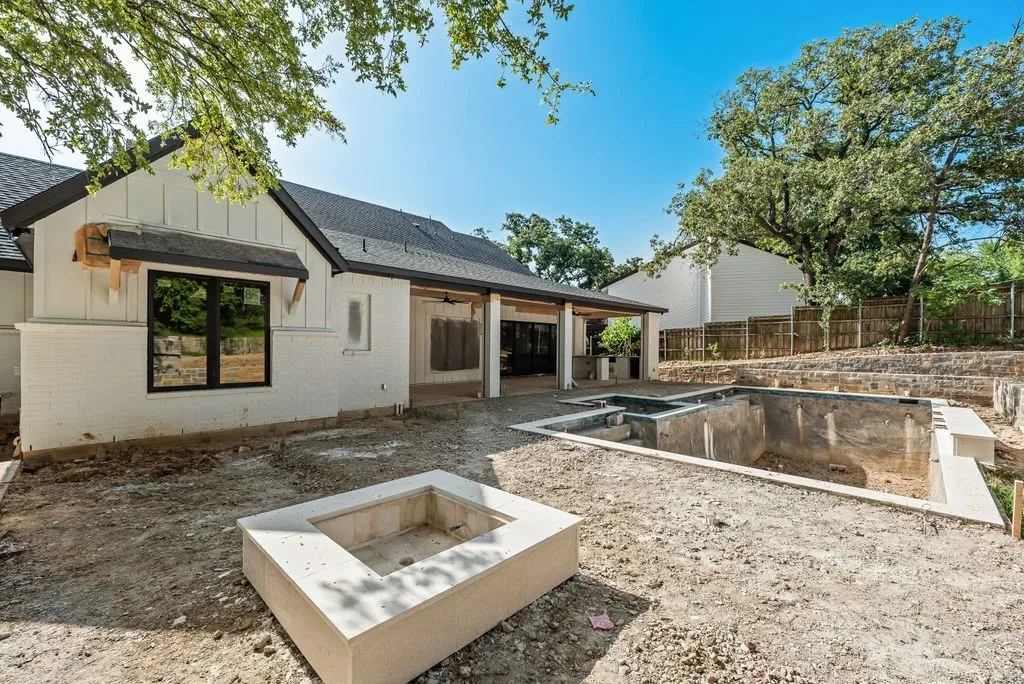 Gas fire pit next to pool
