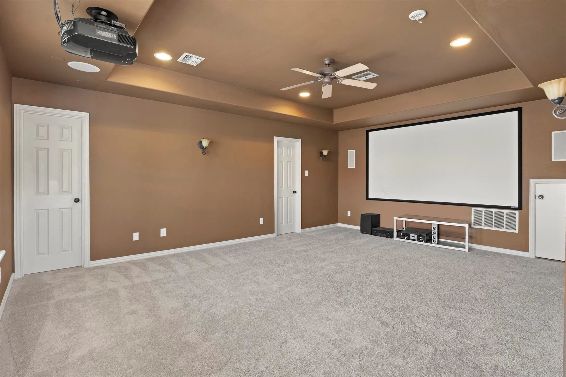 Upstairs bedroom is set up as a media room. Has a full bath and walk in closet.