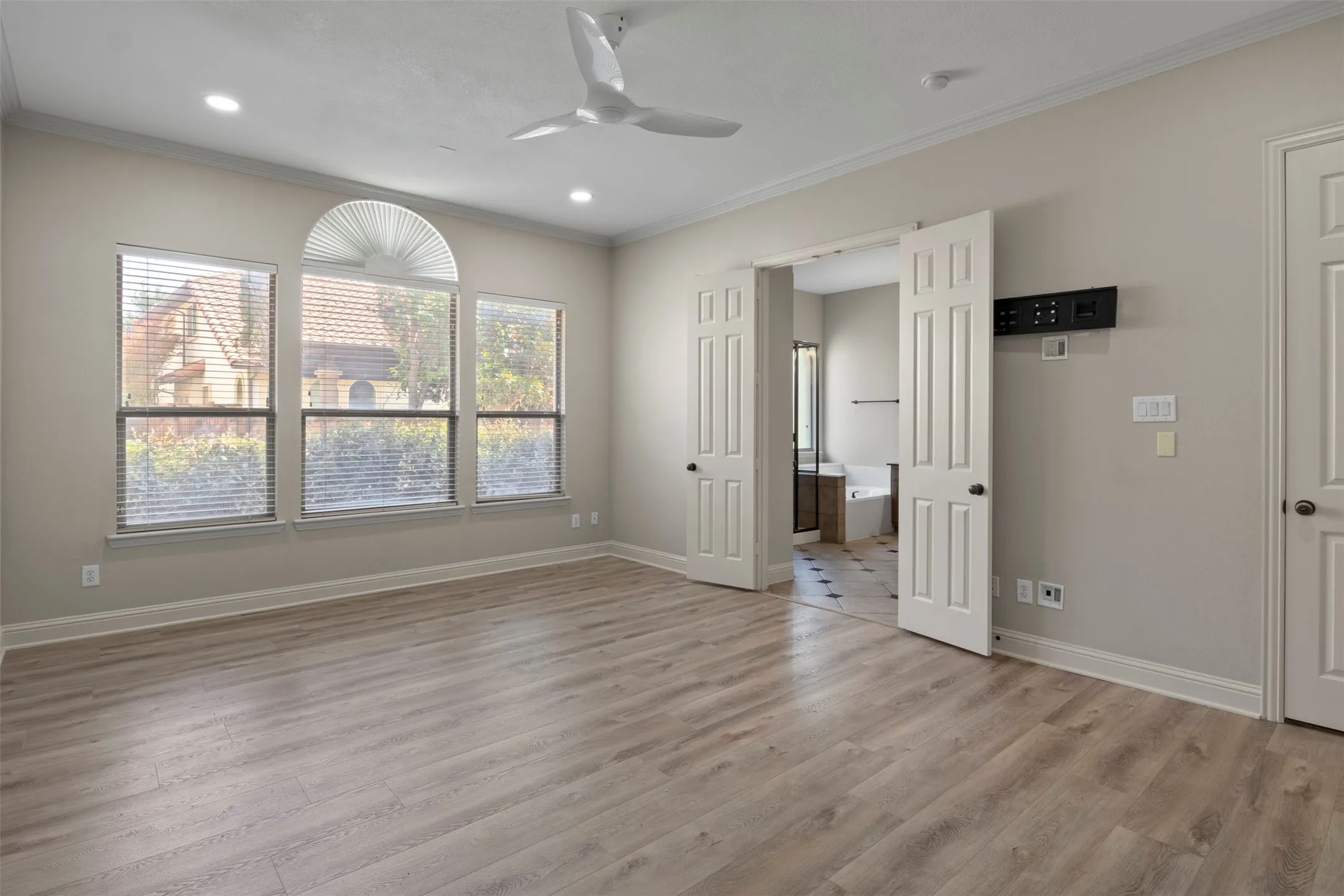 Lots of natural light and a designer ceiling fan.