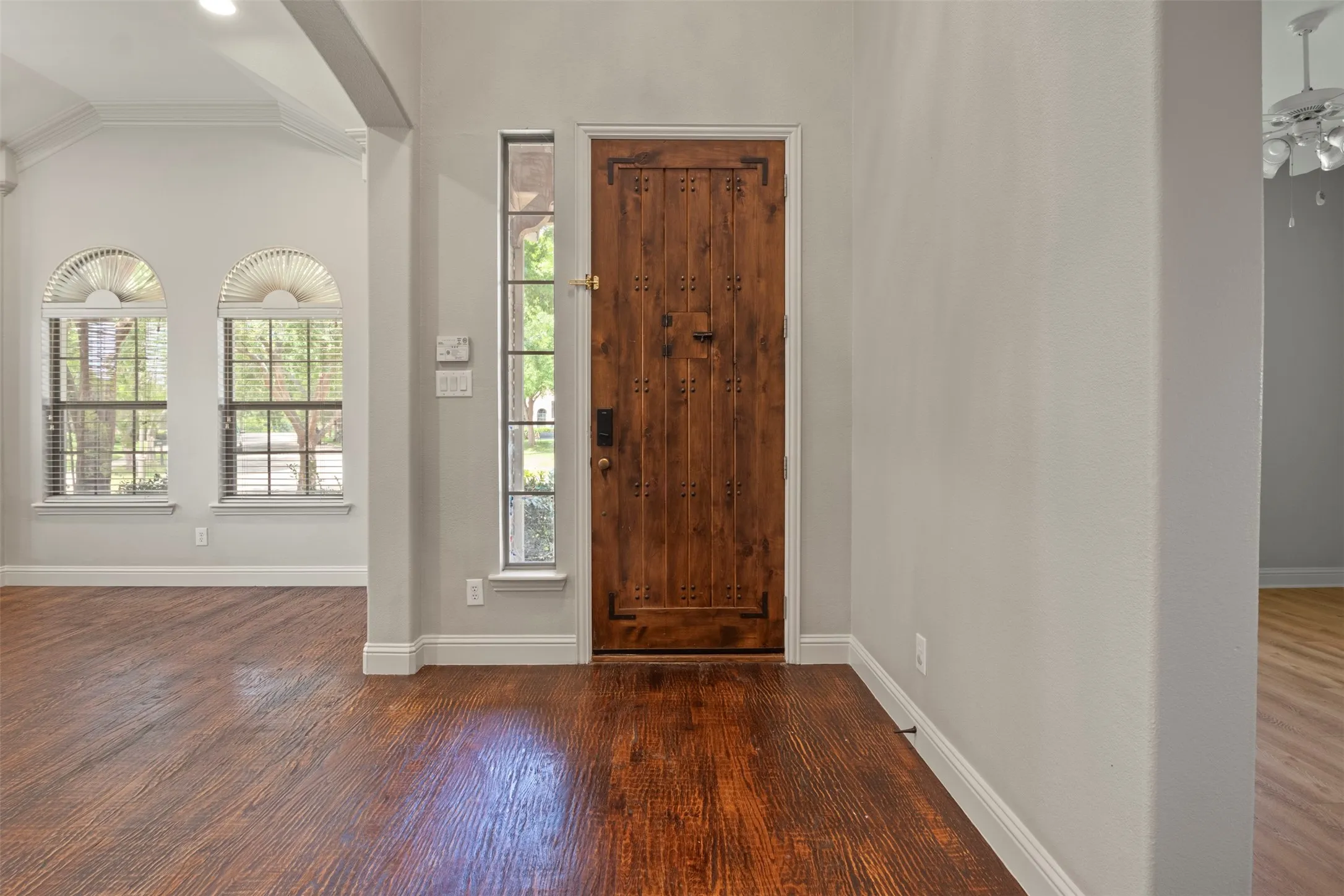 The room on the left can be a formal dining room, a living area or a home office.