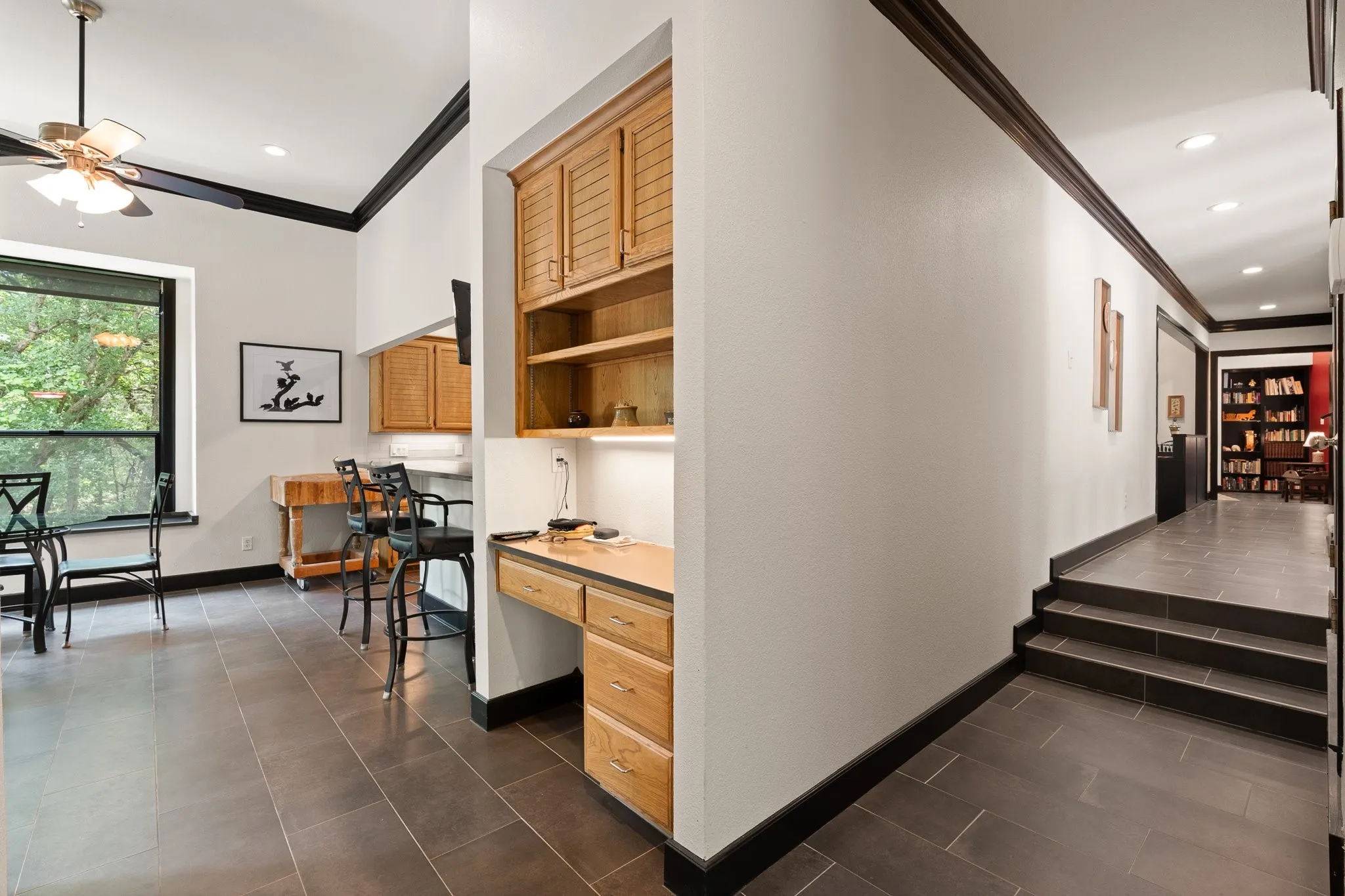 Built in desk and cabinets off the kitchen