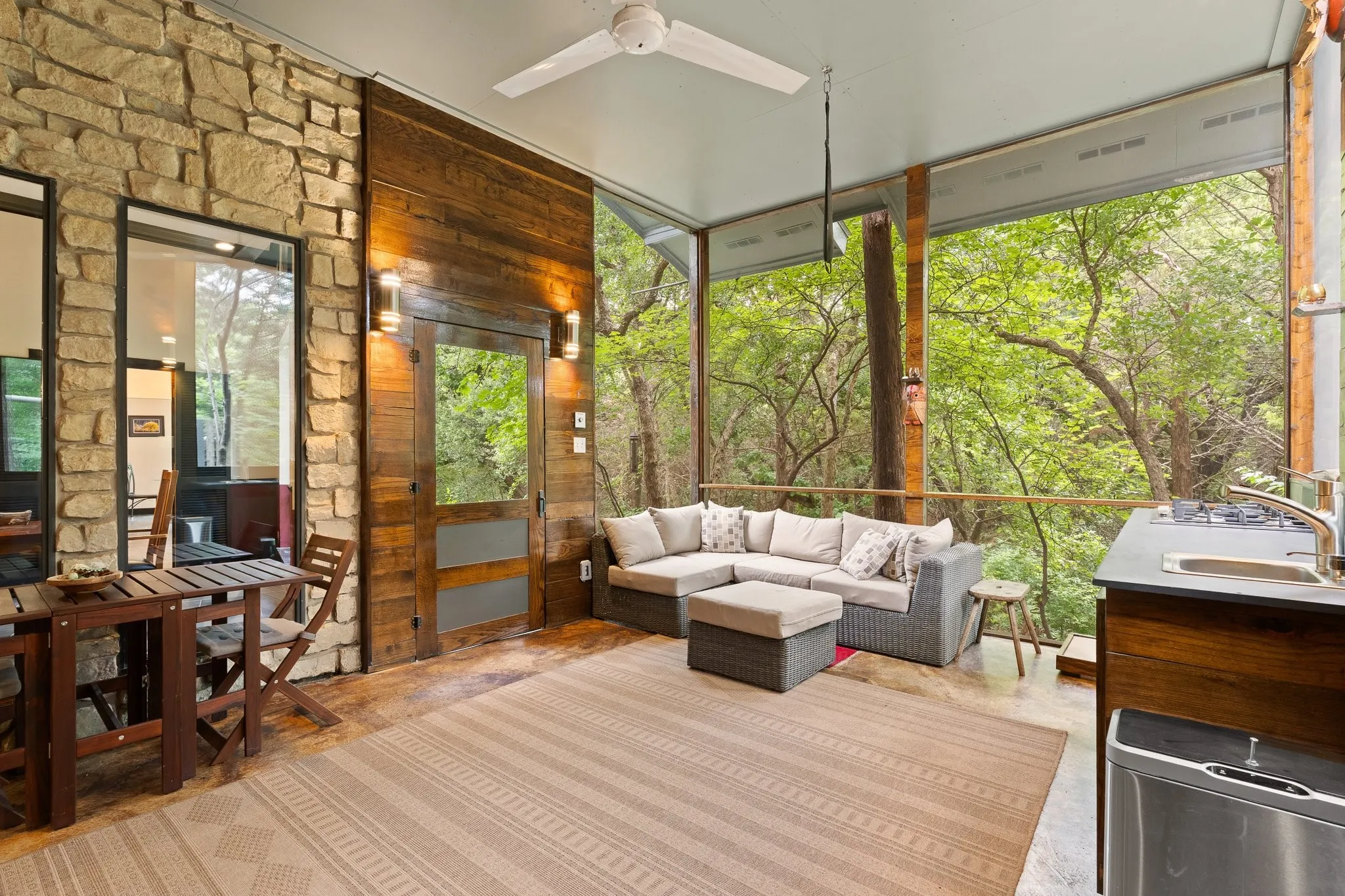 Cozy and peaceful screened in porch that allows you to relax any time of the day