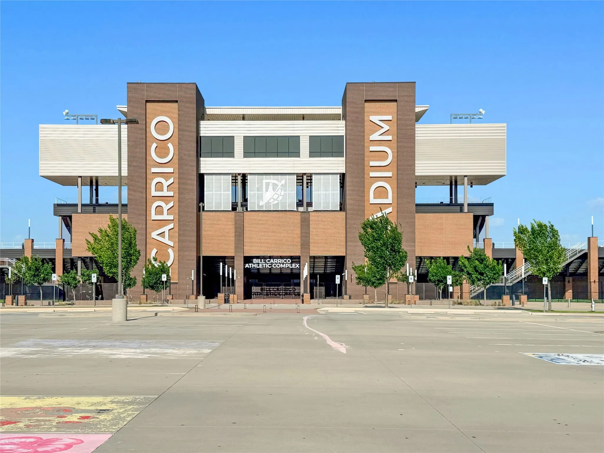 Bill Carrico Athletic Complex Featuring Brick & Paneling Facade Multiple Levels & Plenty of Paved Parking Lot Spaces.