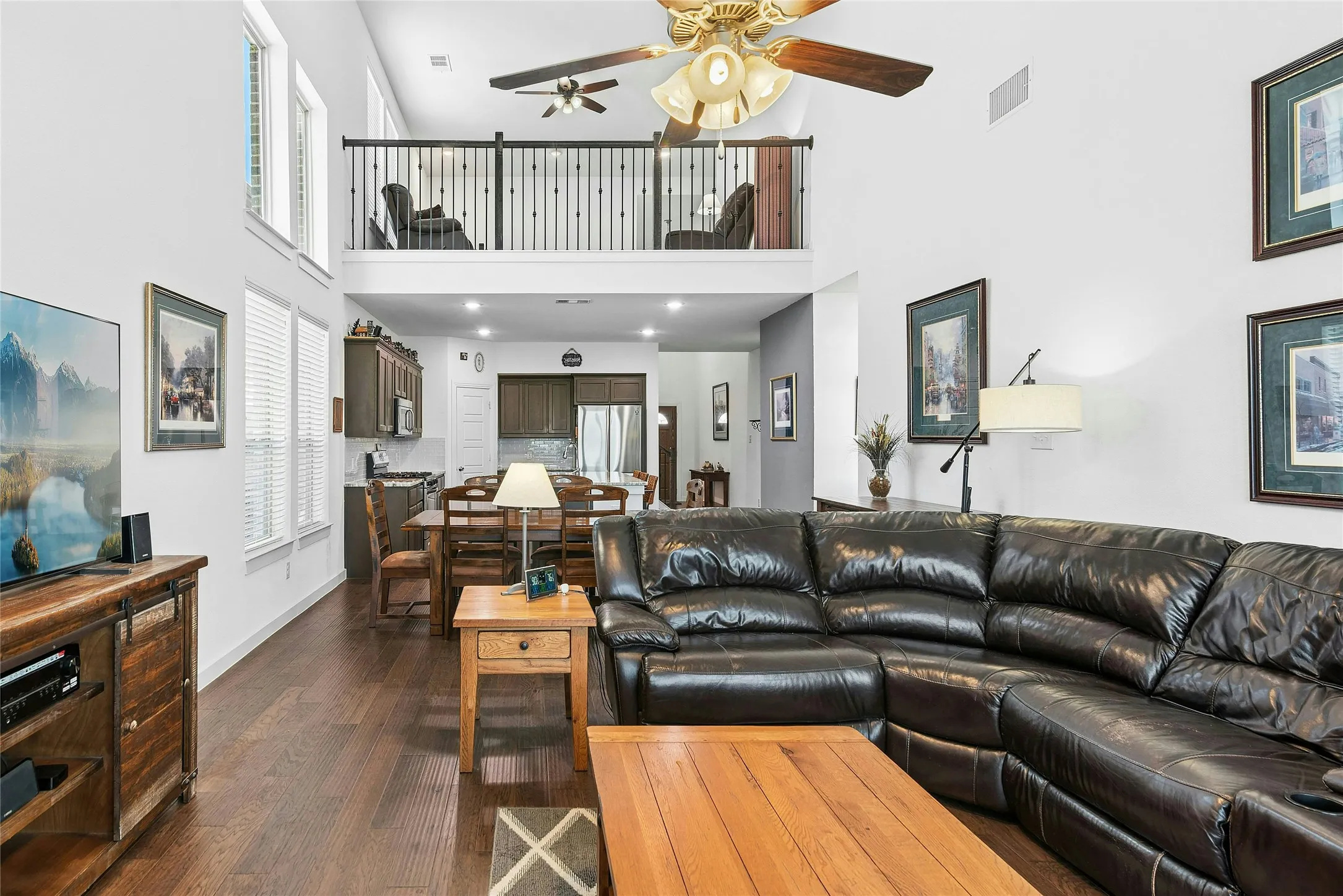 View from Lower Living Room to Kitchen & Upper Loft Living Space.