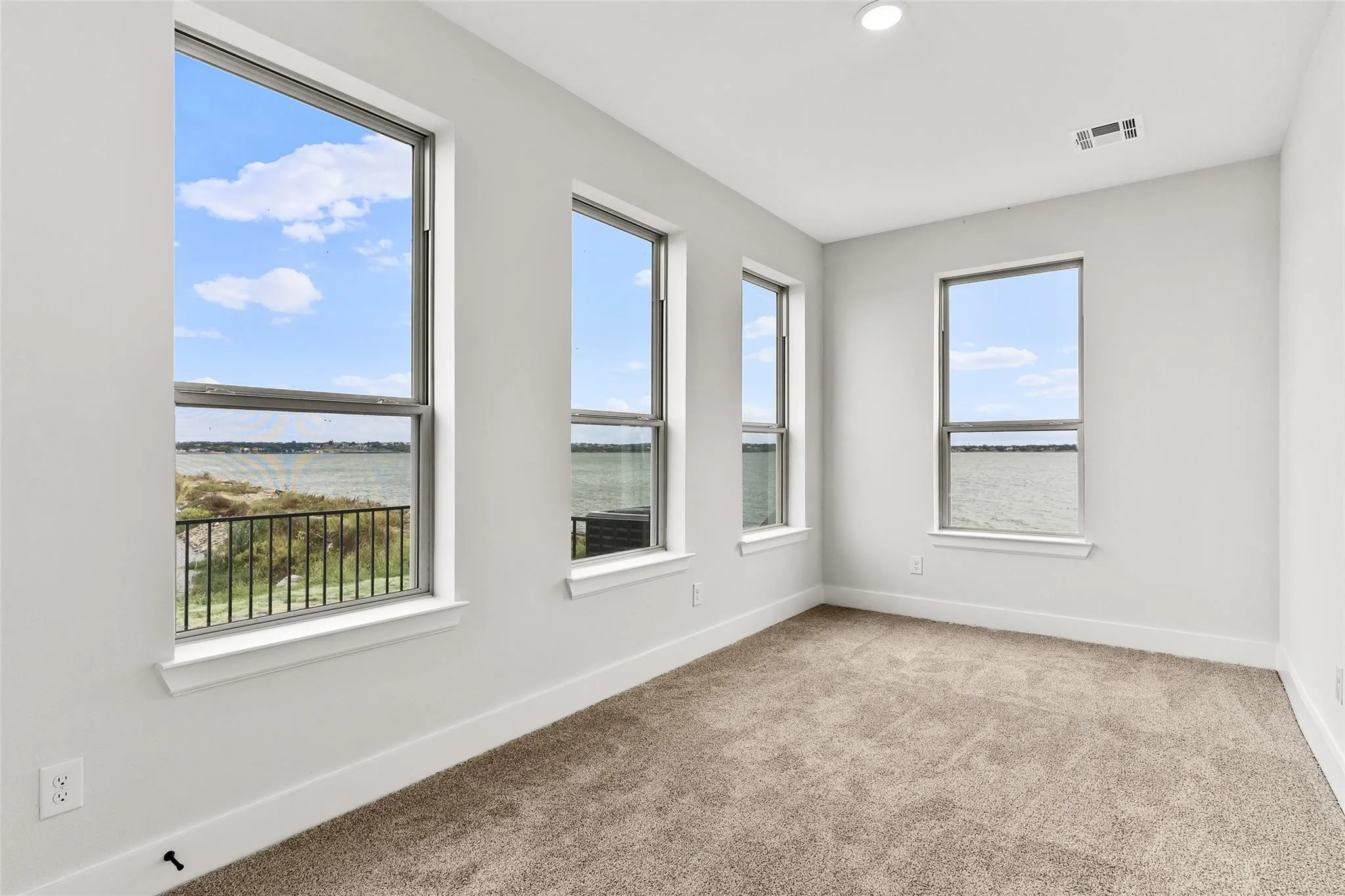 4th bedroom or flex rioom with access to full bath access.  Waterview with access to walk out to patio/deck