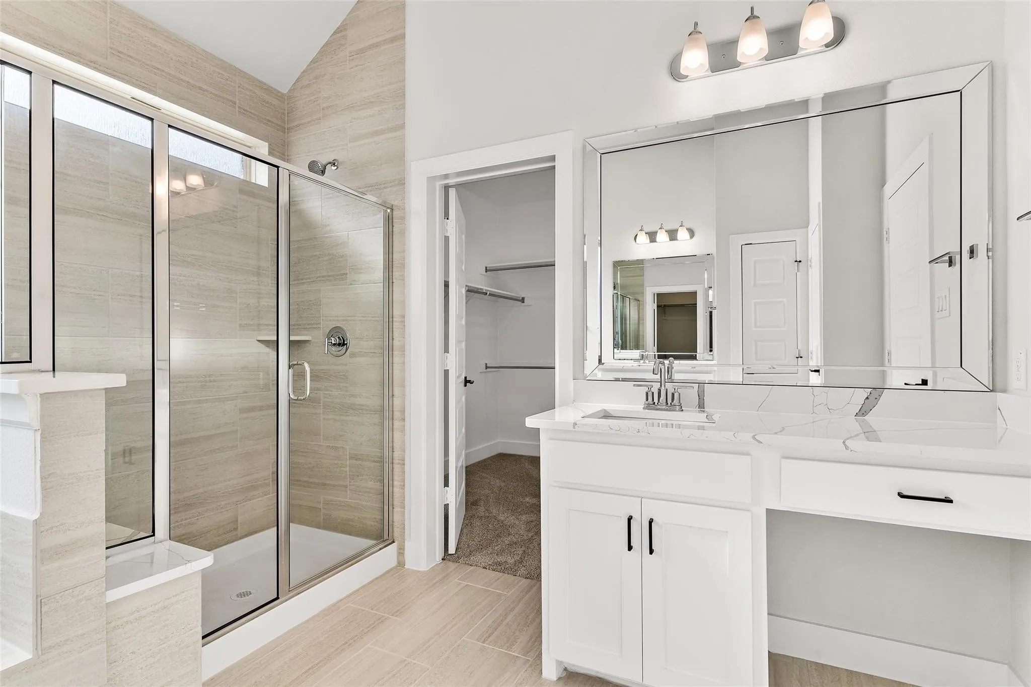 Dual vanities, oversized walk in shower