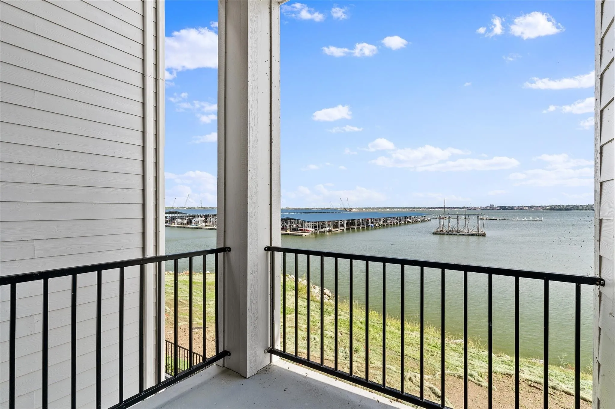 Covered patio off kitchen breakfast area - great lake views