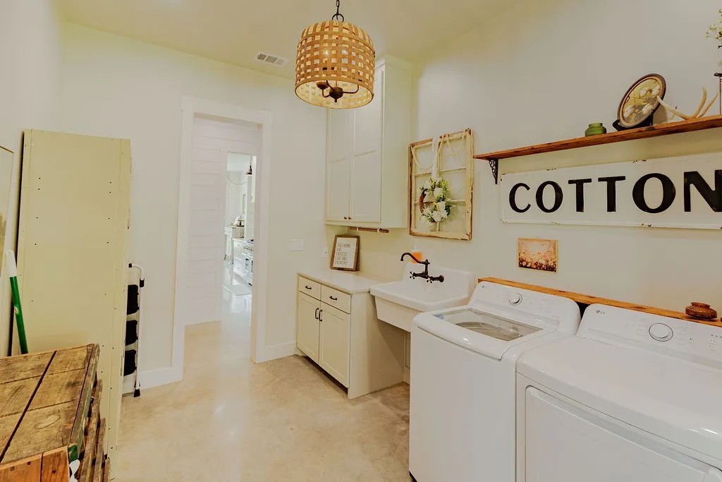 laundry room also opens from primary closet