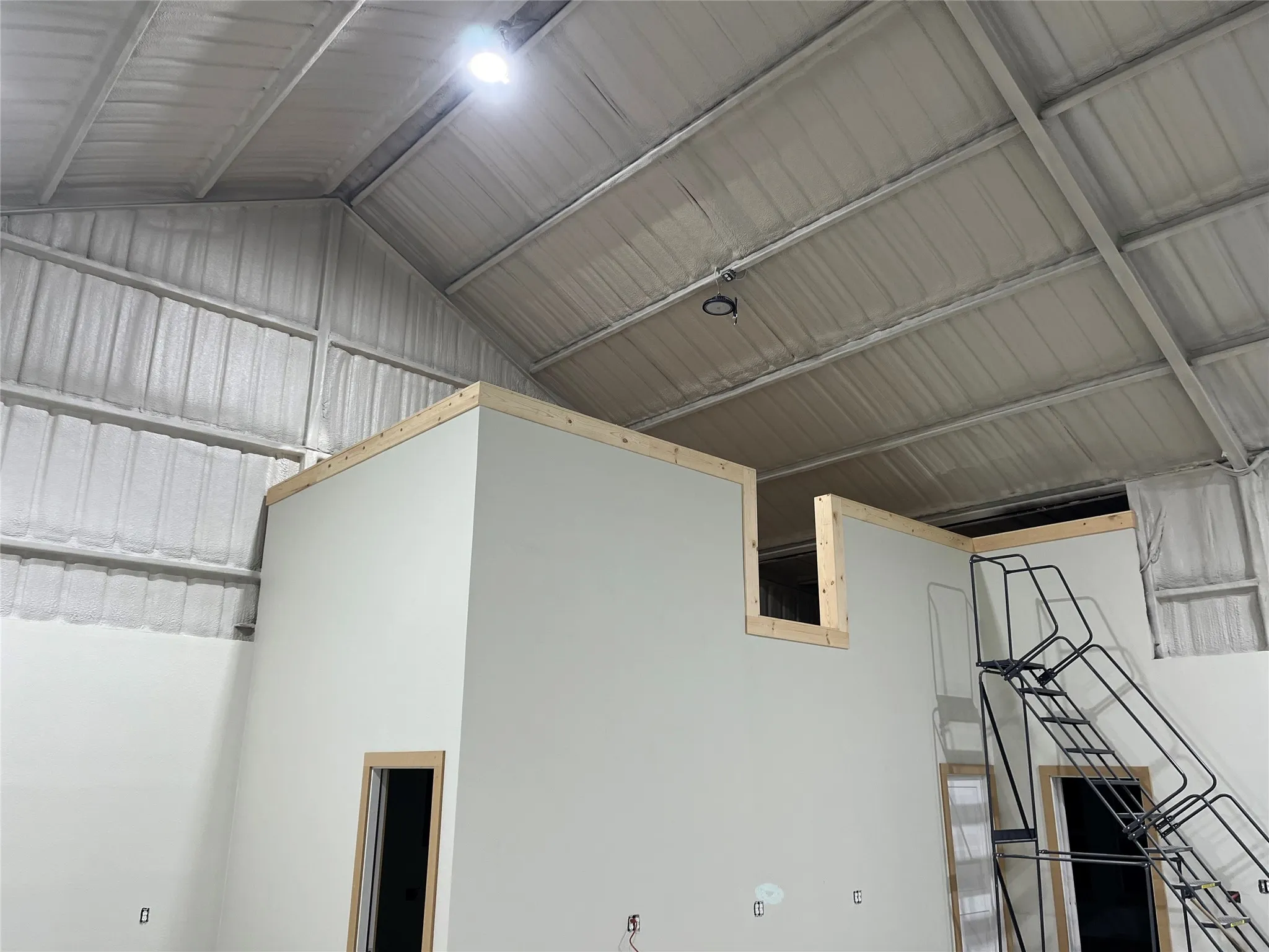 2,400 sq ft. spray foamed shop with storage space on top of air-conditioned room and bathroom