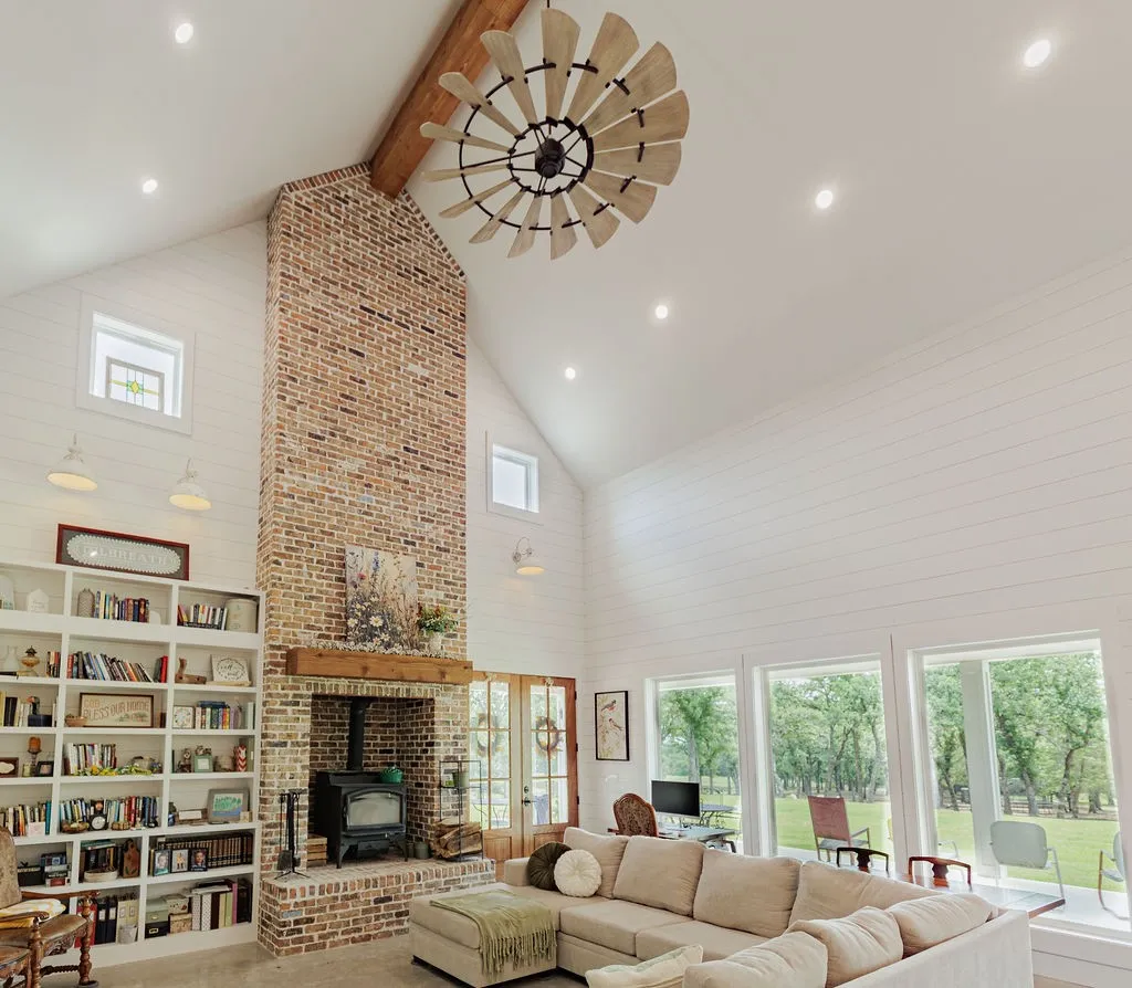 23 feet high ceiling with library wall