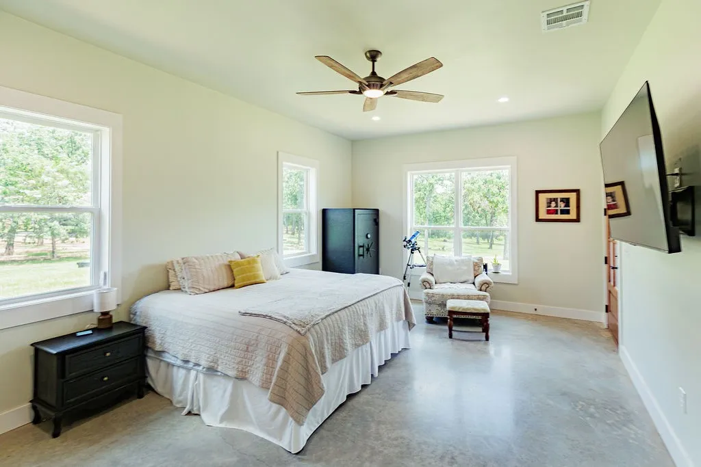 primary bedroom with door to porch