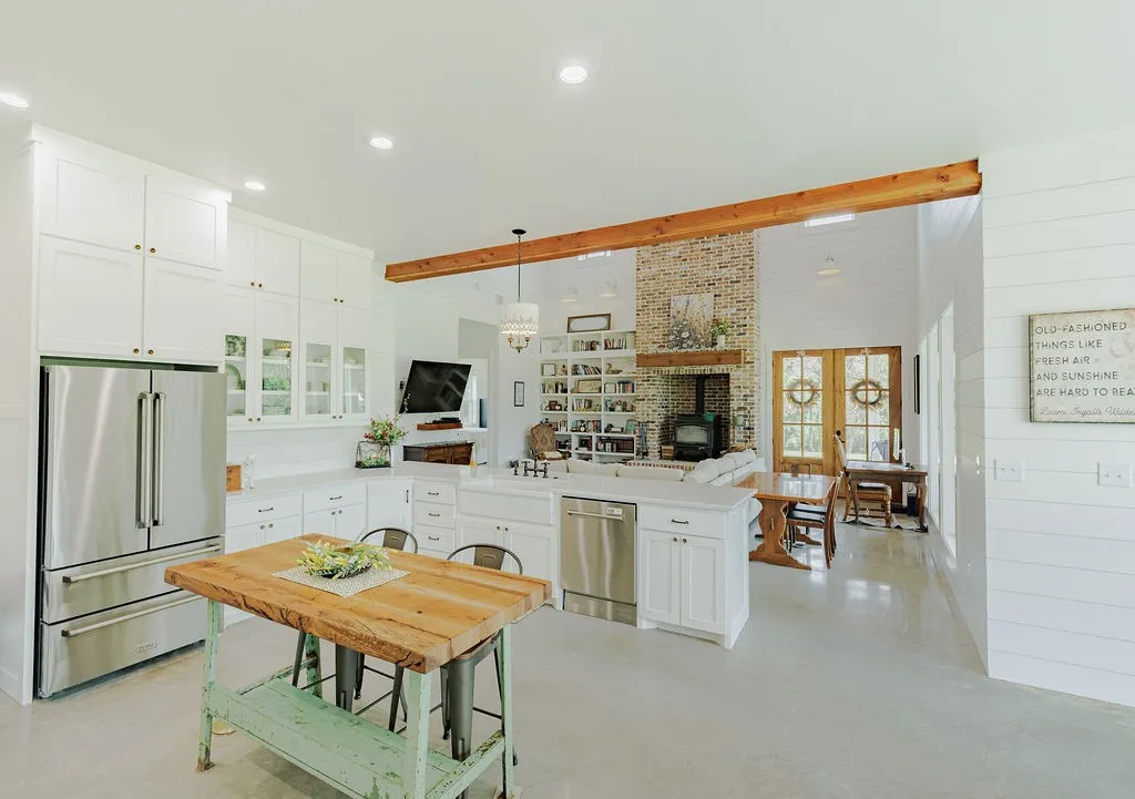 z-line stainless steel appliances and antique brass hardware