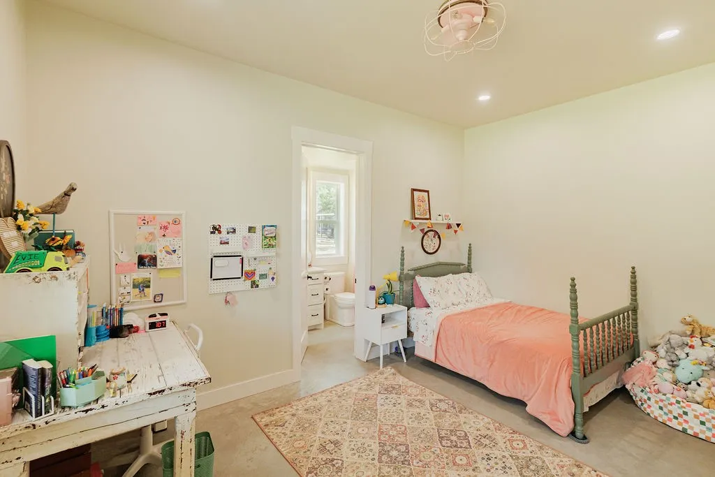 second primary bedroom on first floor with en suite full bathroom