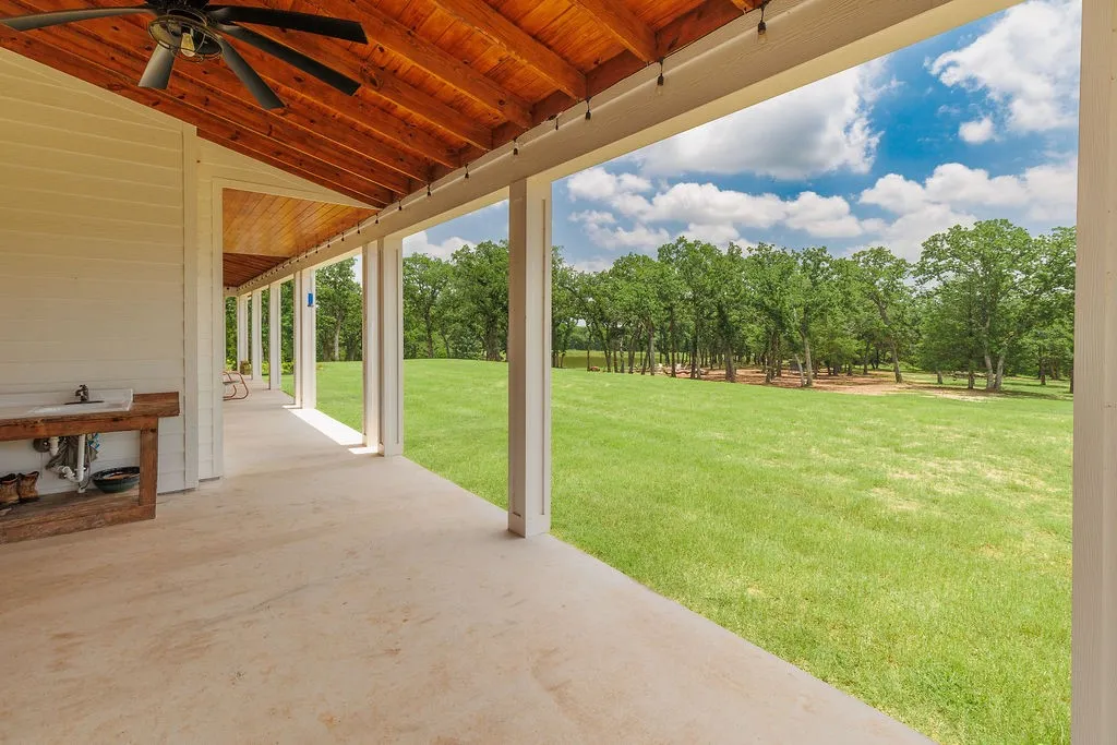 wrap around porch with outdoor sink