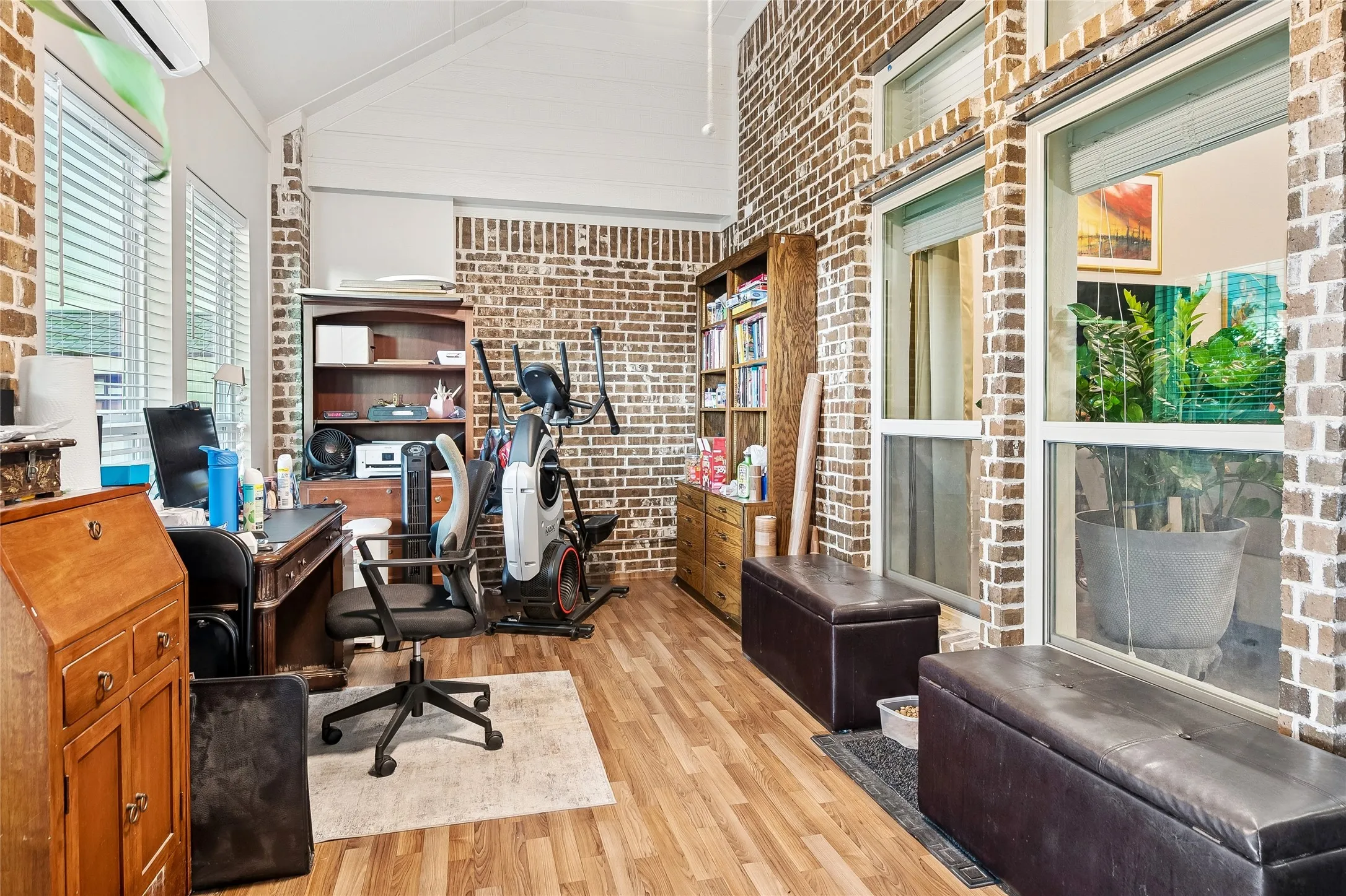 Newly enclosed sun room used as second office