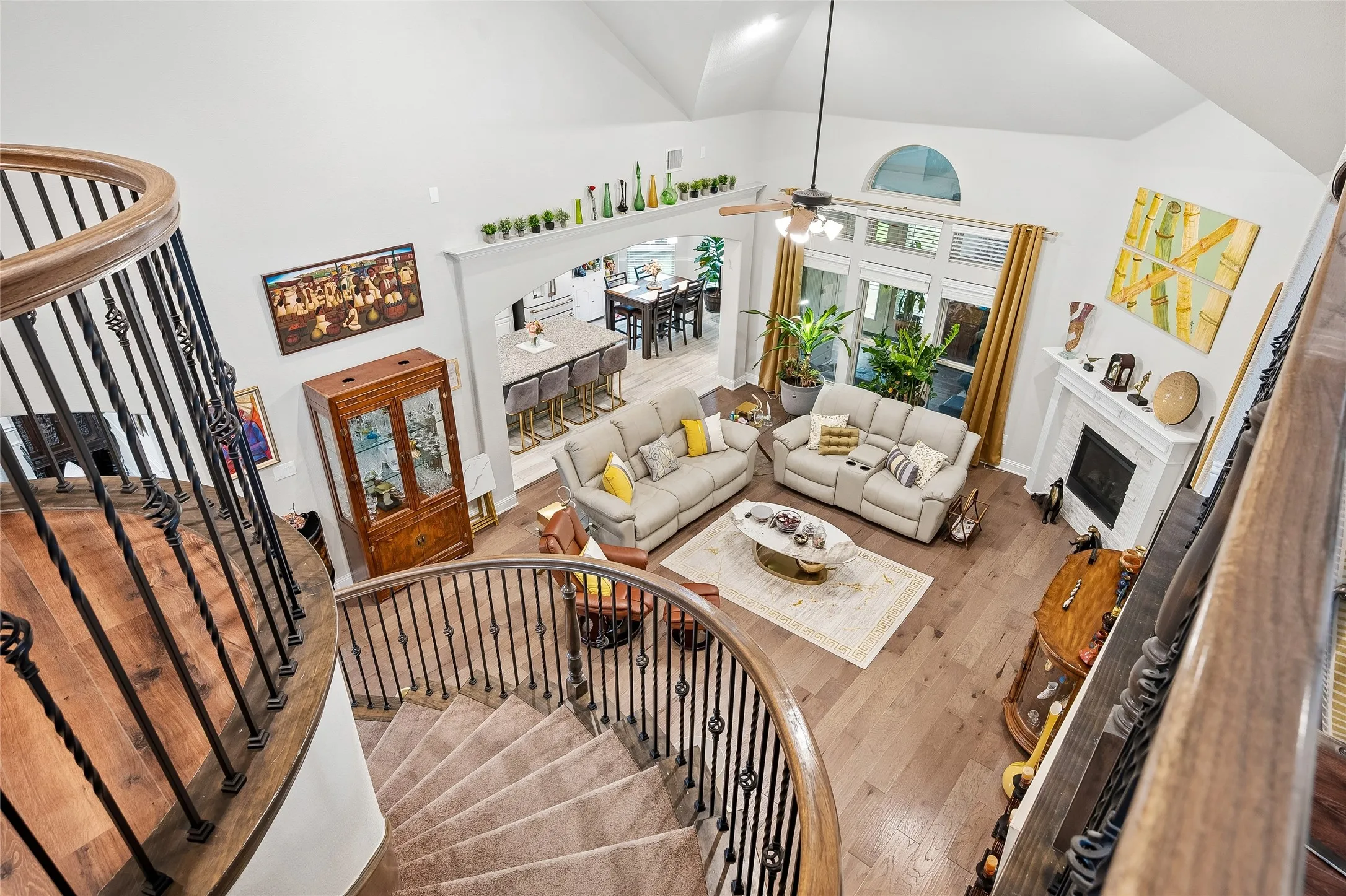 Juliette balcony overlooking two story living room