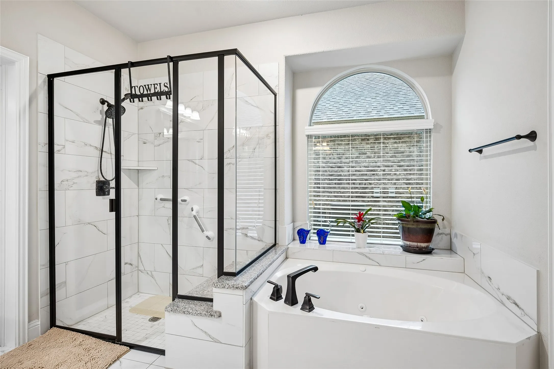 Jetted tub and large walk in shower