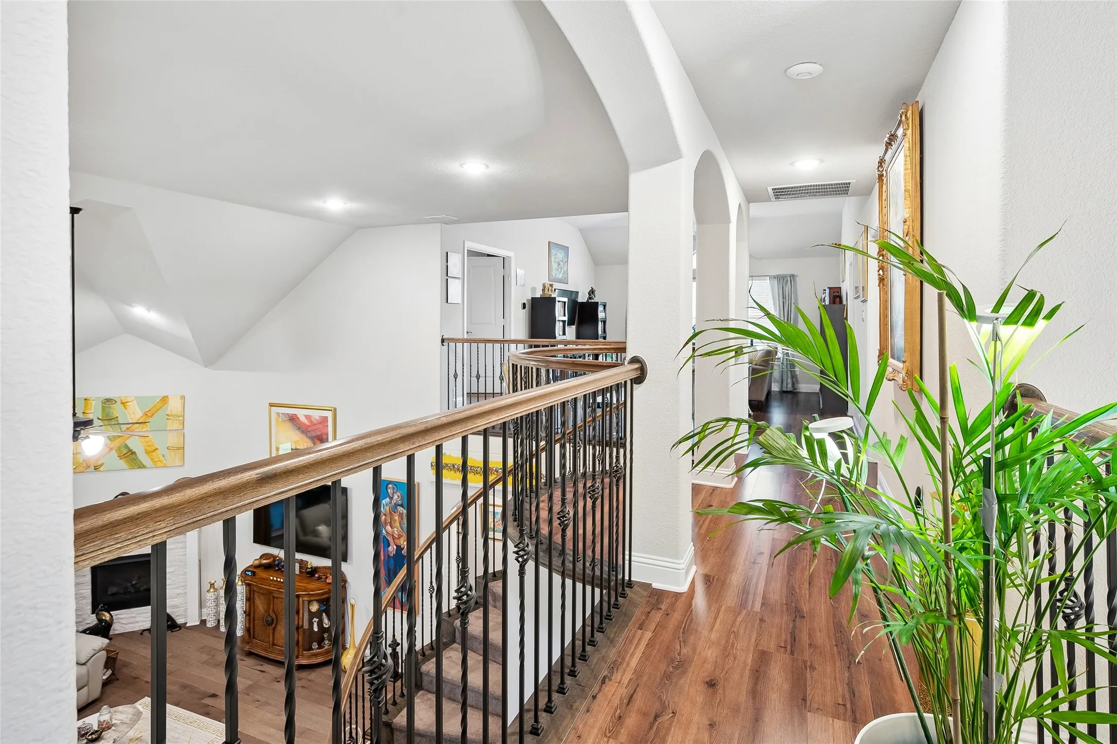 Inviting upstairs hallway overlooks living room