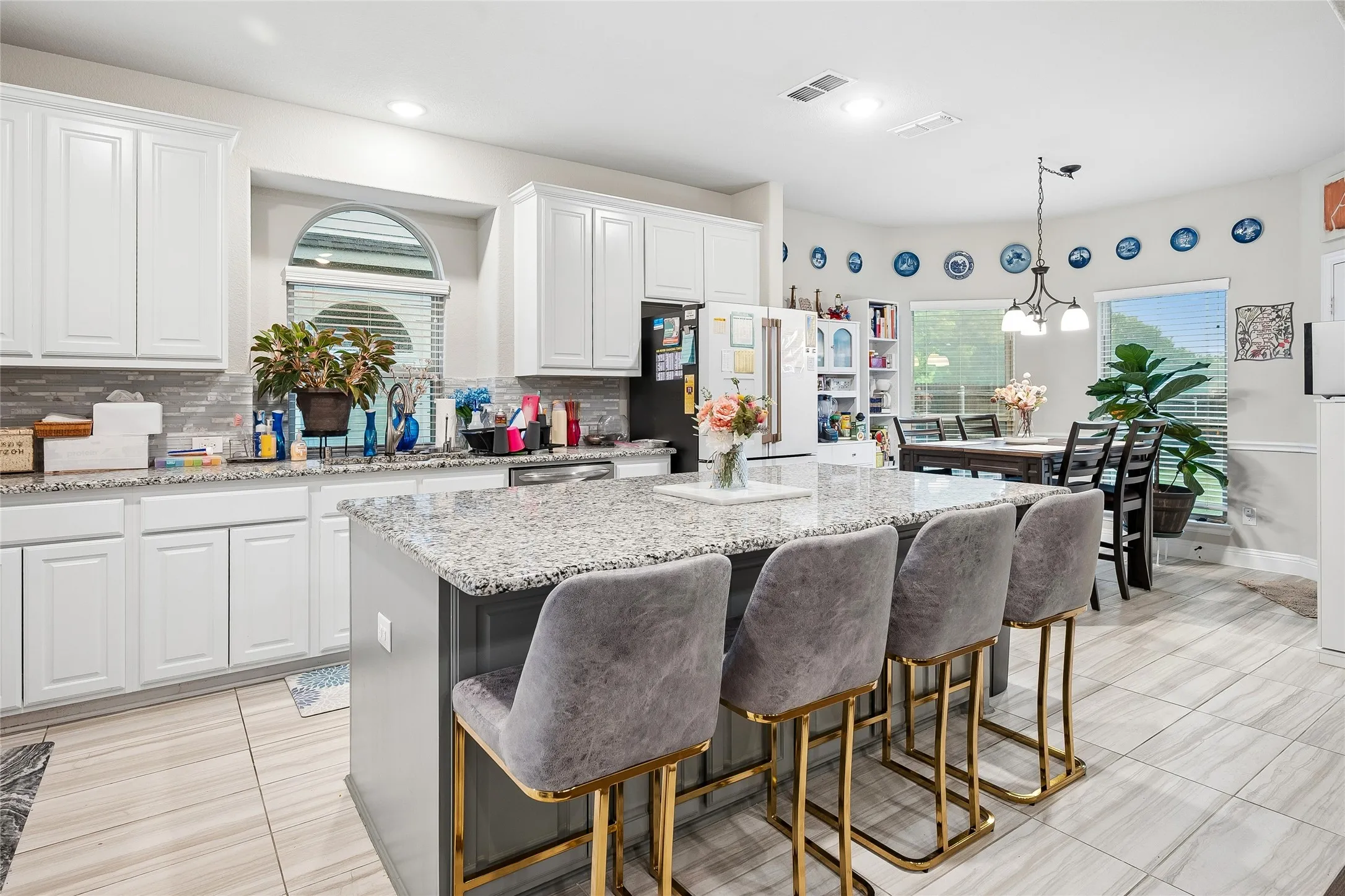 Generous island accommodates bar stools. Great for entertaining or family life