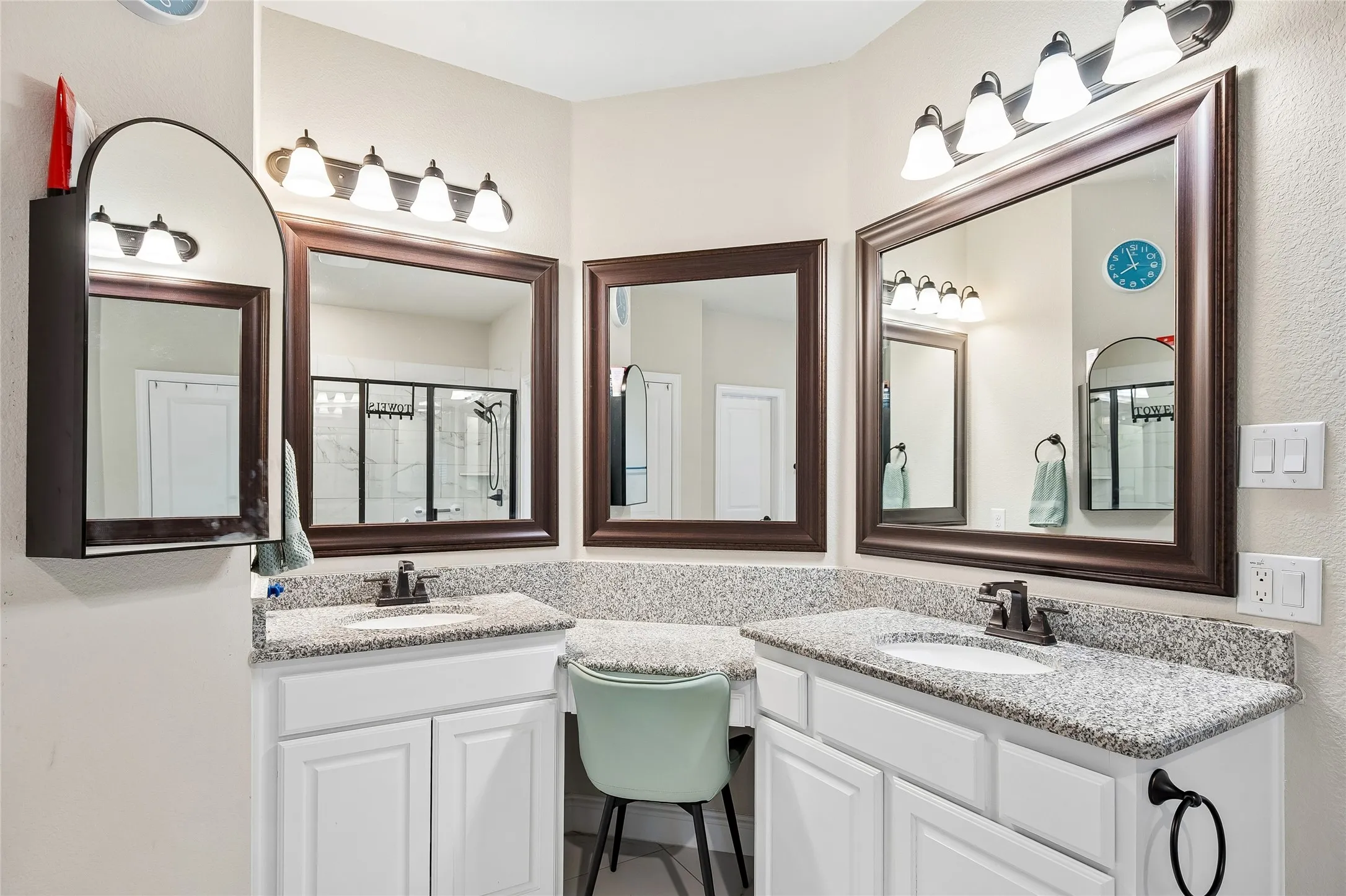 Separate sinks with make up vanity