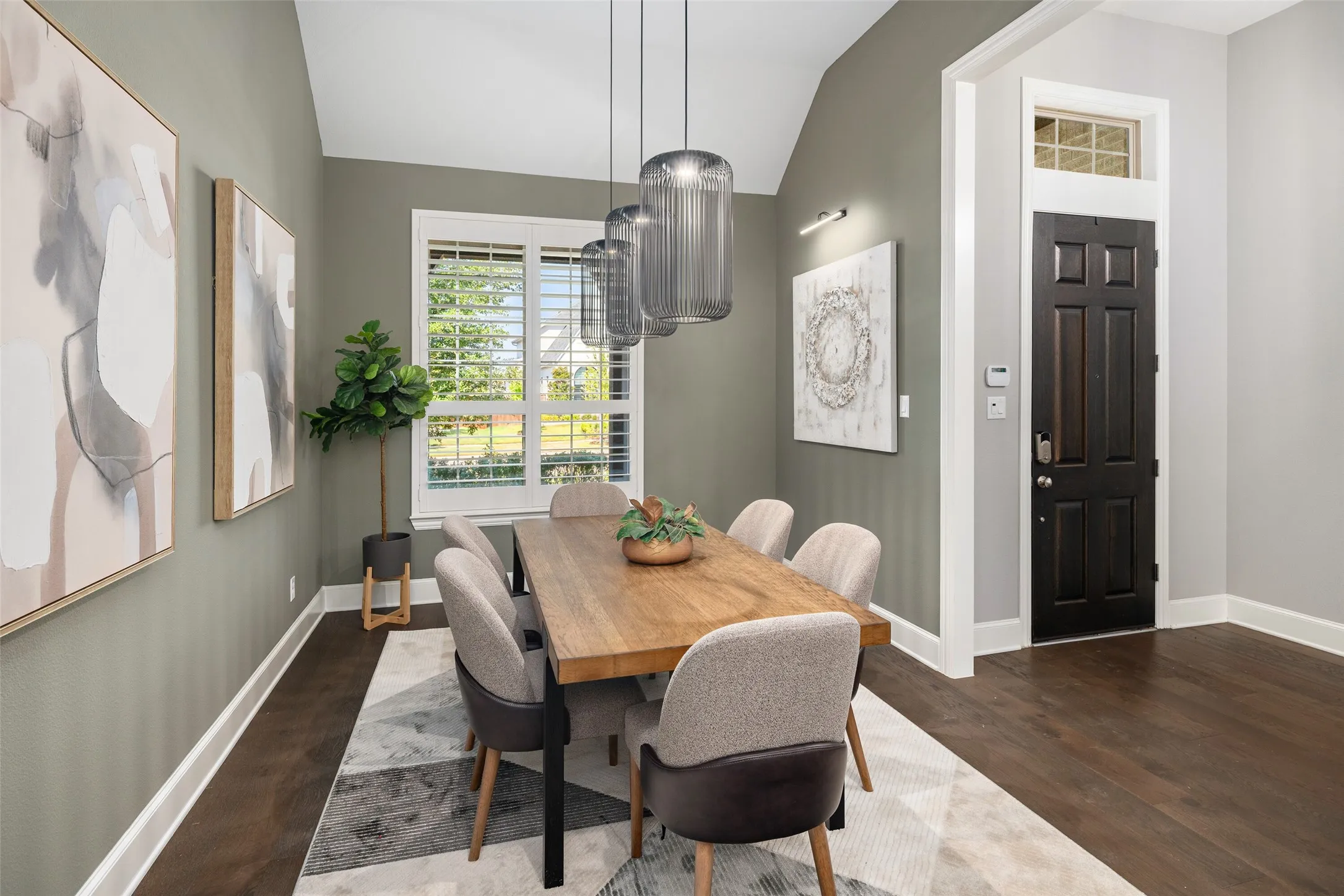 Perfectly positioned near the entry, this sophisticated space sets the stage for memorable gatherings and formal entertaining.