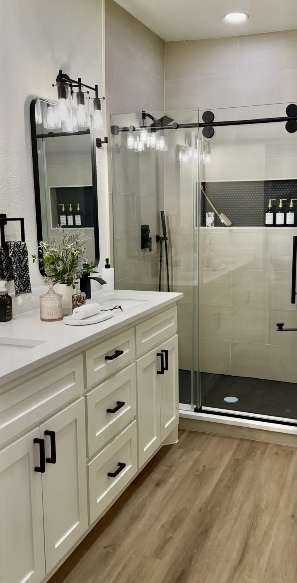Barn door shower, multiple shower heads. Master bathroom
