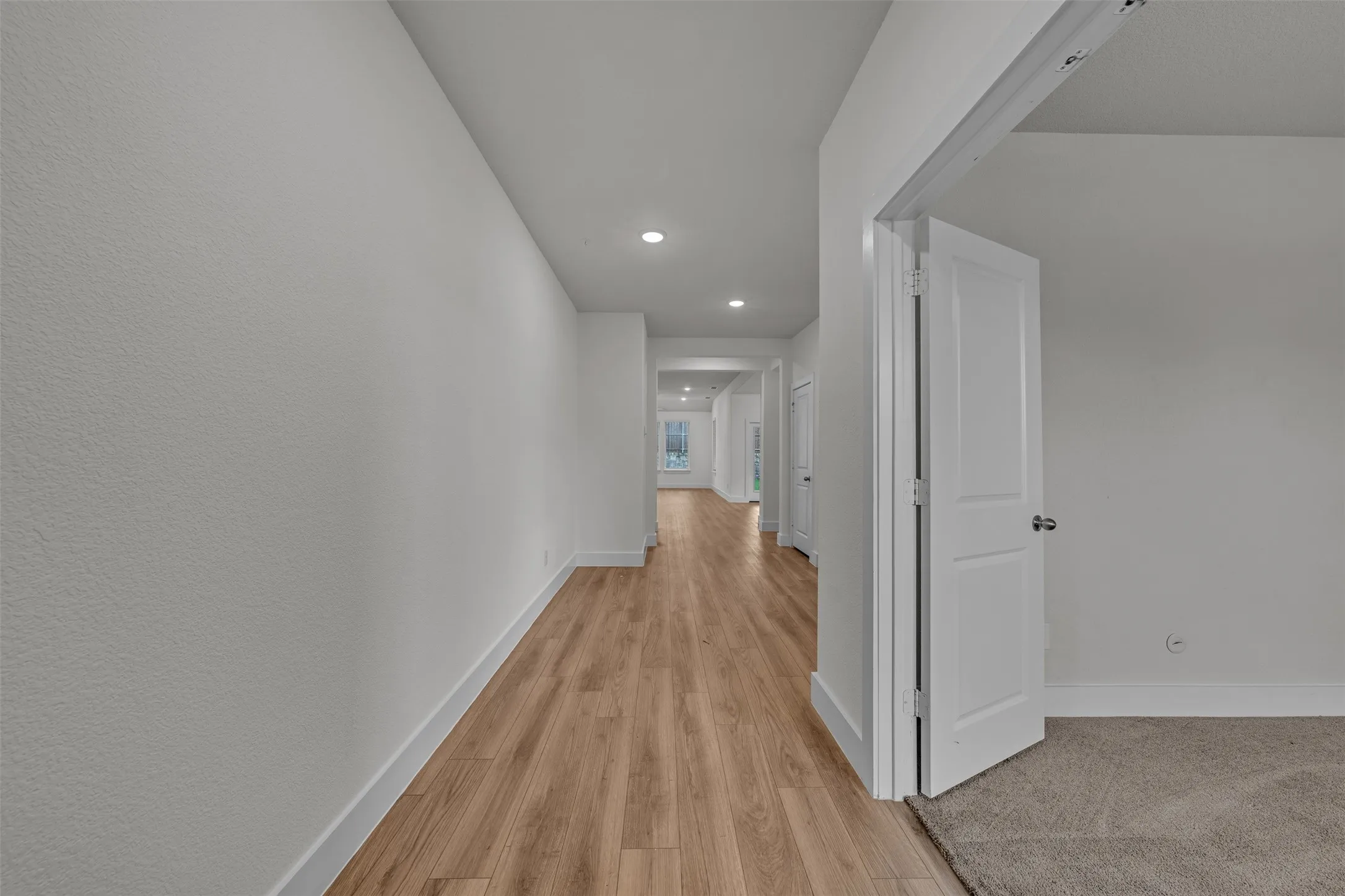 Entry Foyer at 5149 Cantle Ct in Fort Worth, Texas, Tarrant County, with neutral colored LVP flooring and the dedicated office with double door entry.