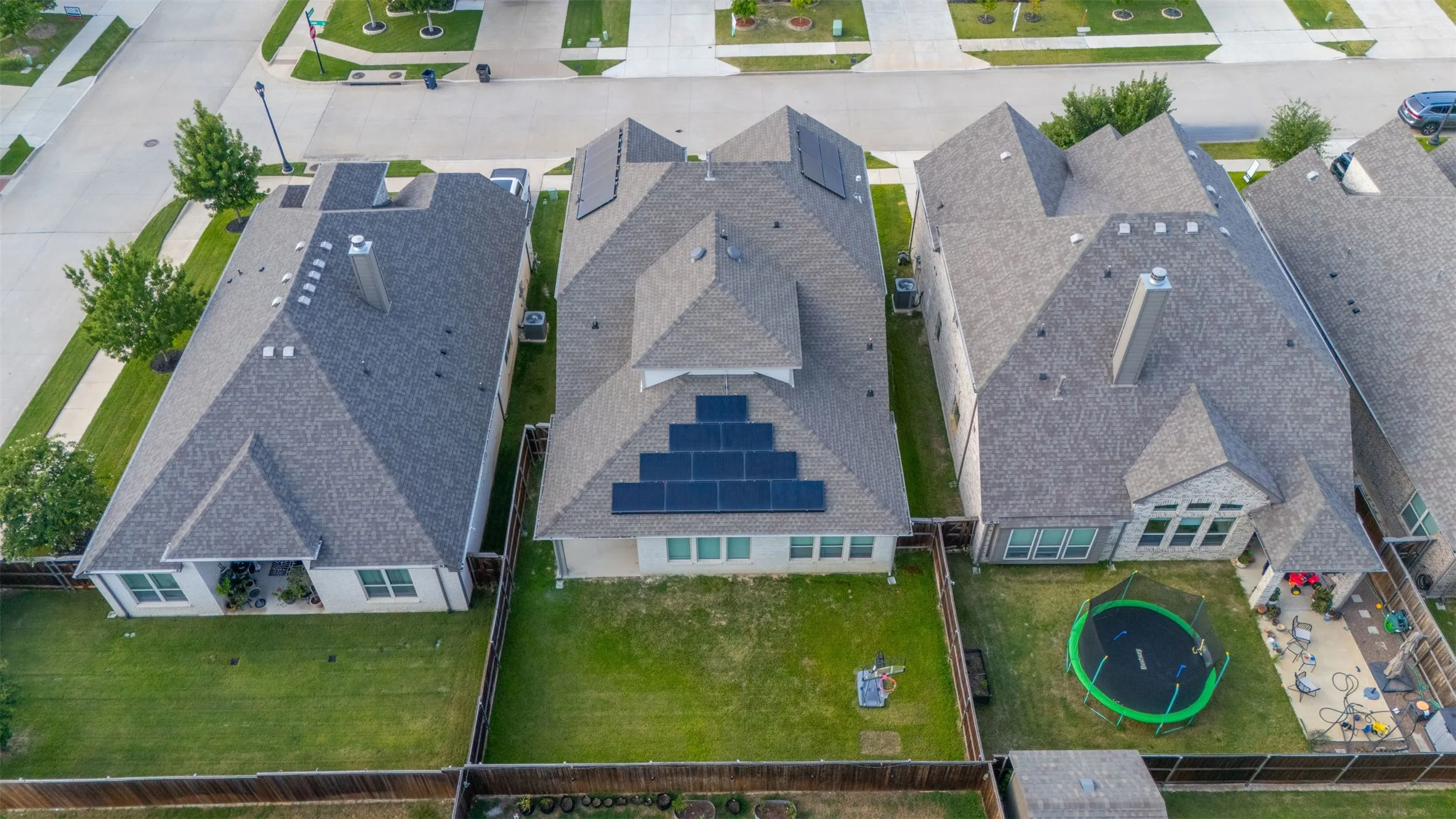 Aerial view at 5149 Cantle Ct in Fort Worth, Texas, Tarrant County, located on a cul-de-sac for minimal traffic and a flat lot with front landscaping and solar panels (paid off at closing) for energy efficiency.