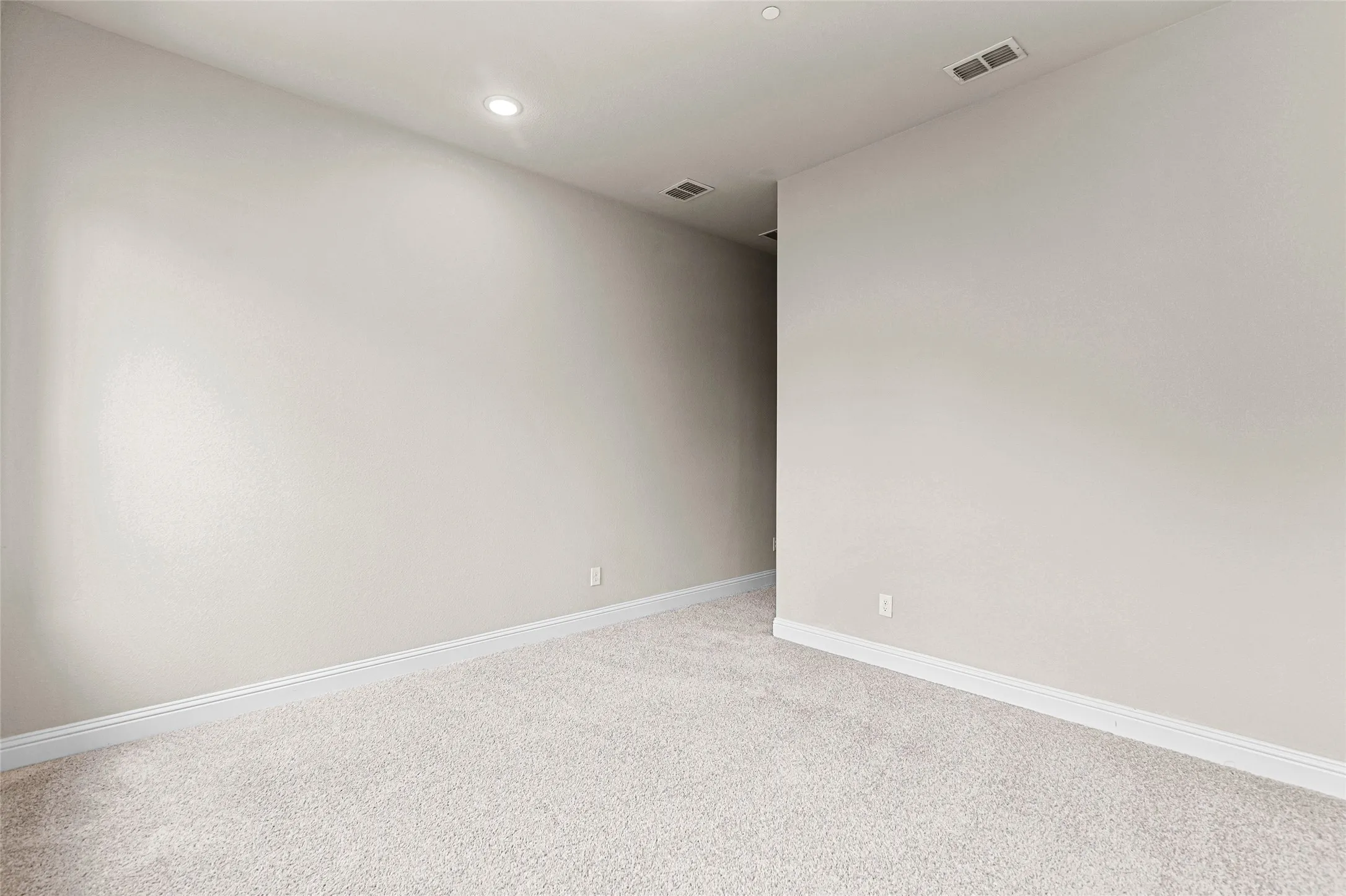 4th Bedroom Room featuring light-toned carpeting, neutral wall paint, white baseboards, and recessed ceiling lighting