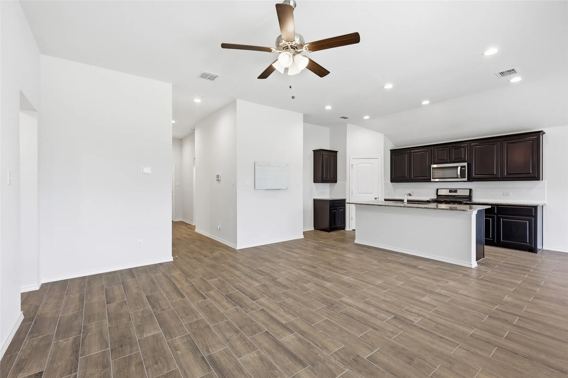 Looking toward the kitchen from the far corner