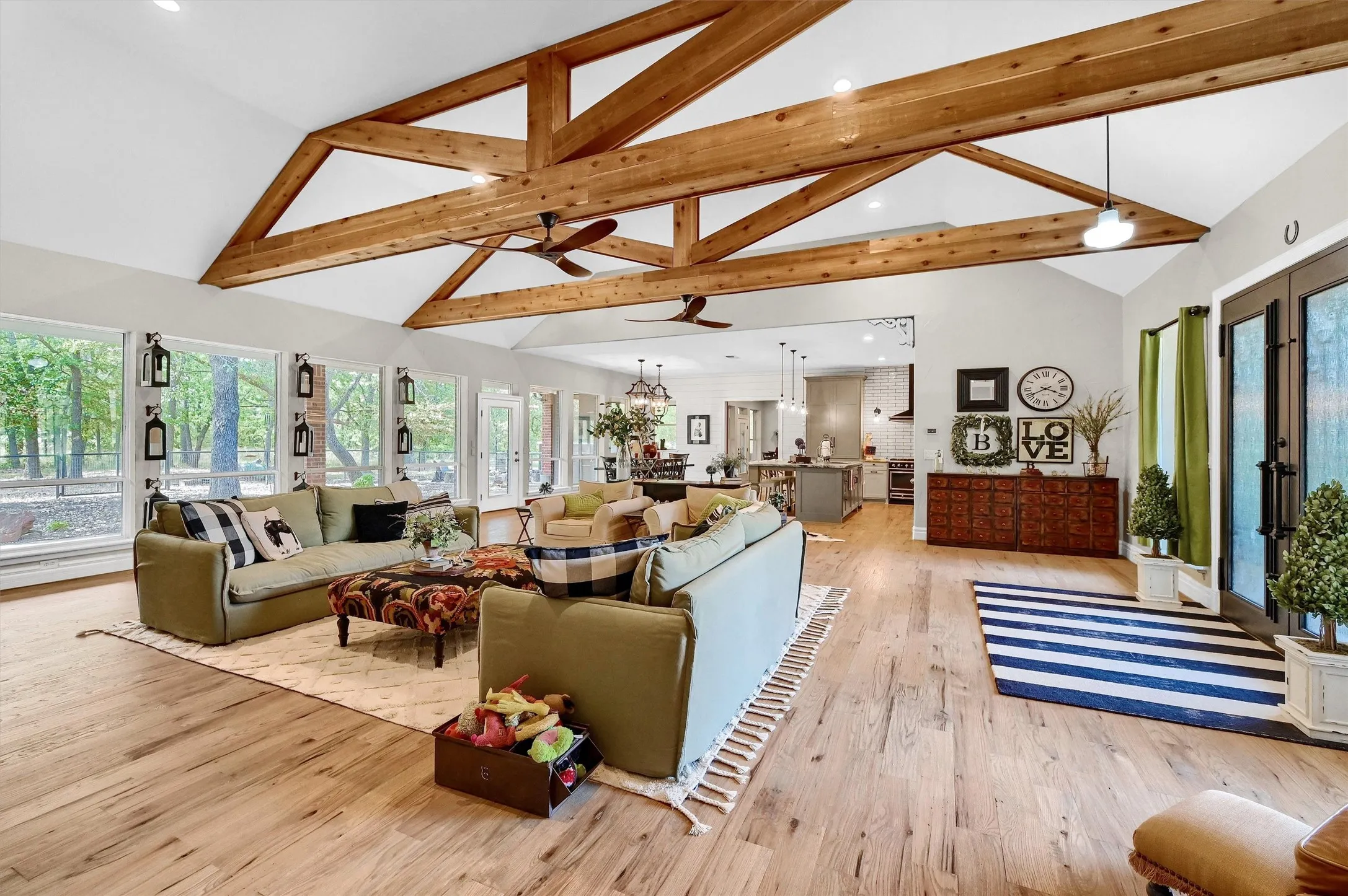 View of the living area, dining area and kitchen - great floor plan for family and entertaining.