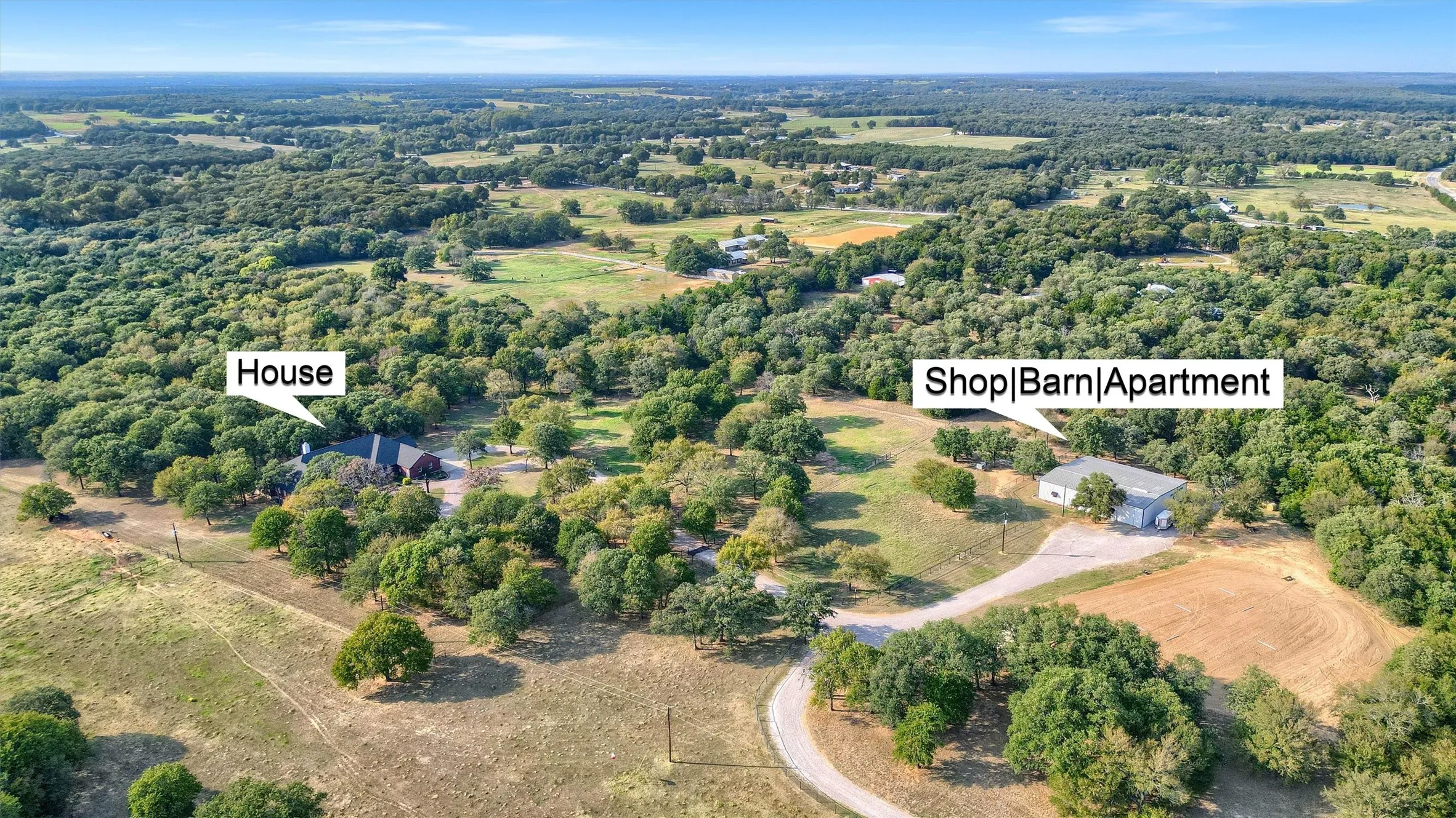 Shop-barn is conveniently located yet separate from the home.